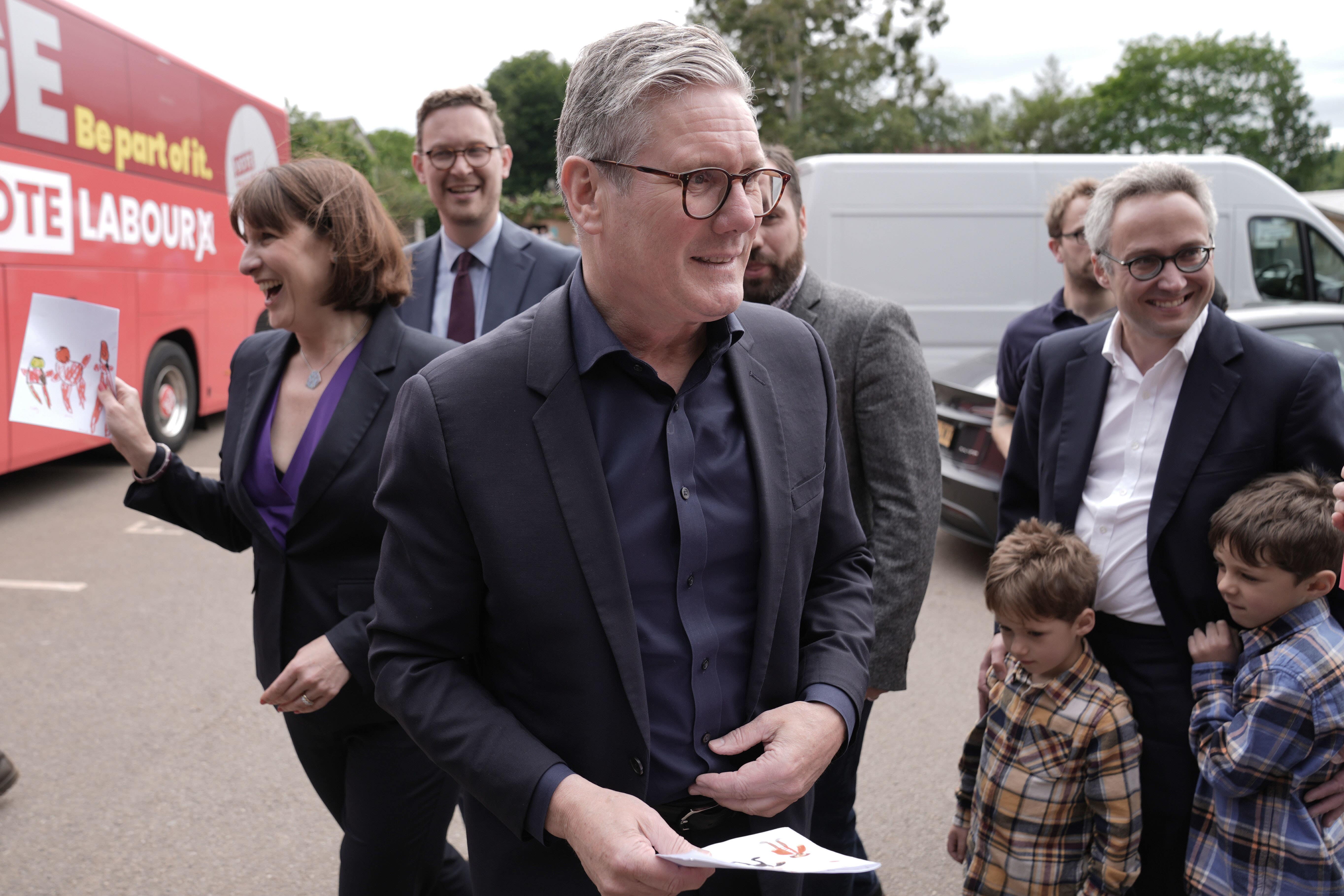 Labour leader Sir Keir Starmer and shadow chancellor Rachel Reeves arrive for a visit to Heath Farm in Chipping Norton while on the General Election campaign trail (Stefan Rousseau/PA)