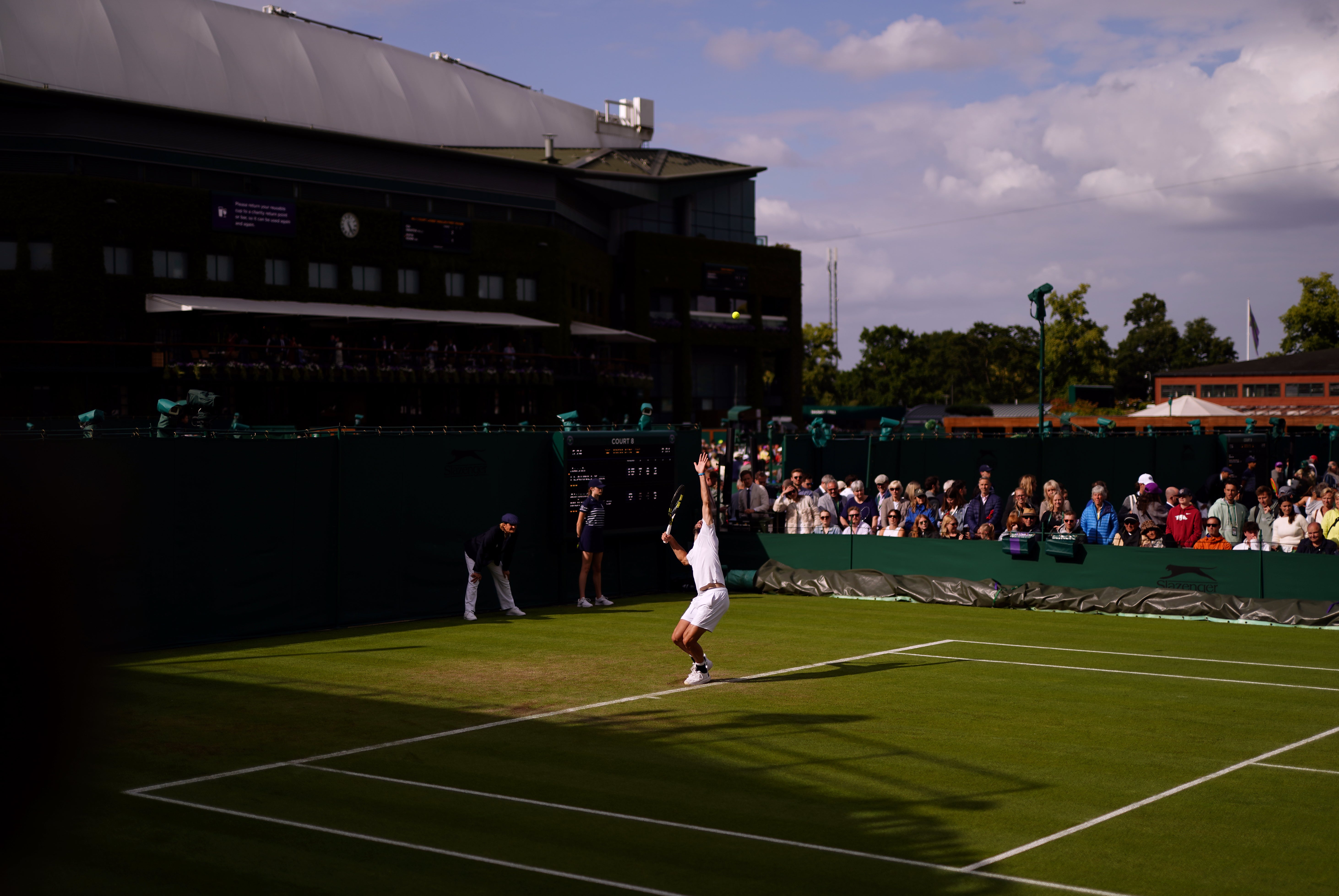 Jacob Fearnley serves in front of Centre Court (Jordan Pettitt/PA)