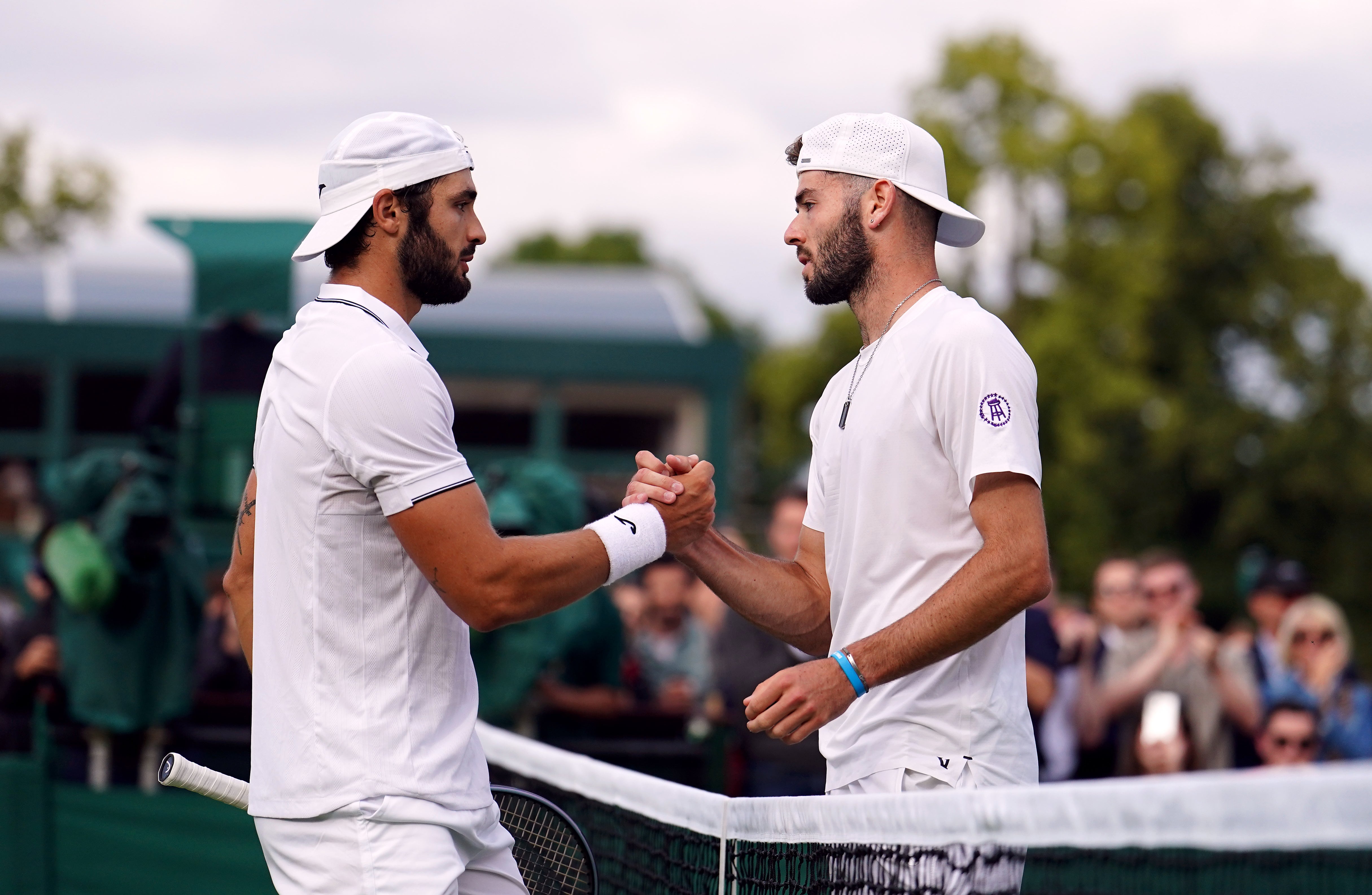 Jacob Fearnley and Alejandro Moro Canas (left) shake hands (Jordan Pettitt/PA)