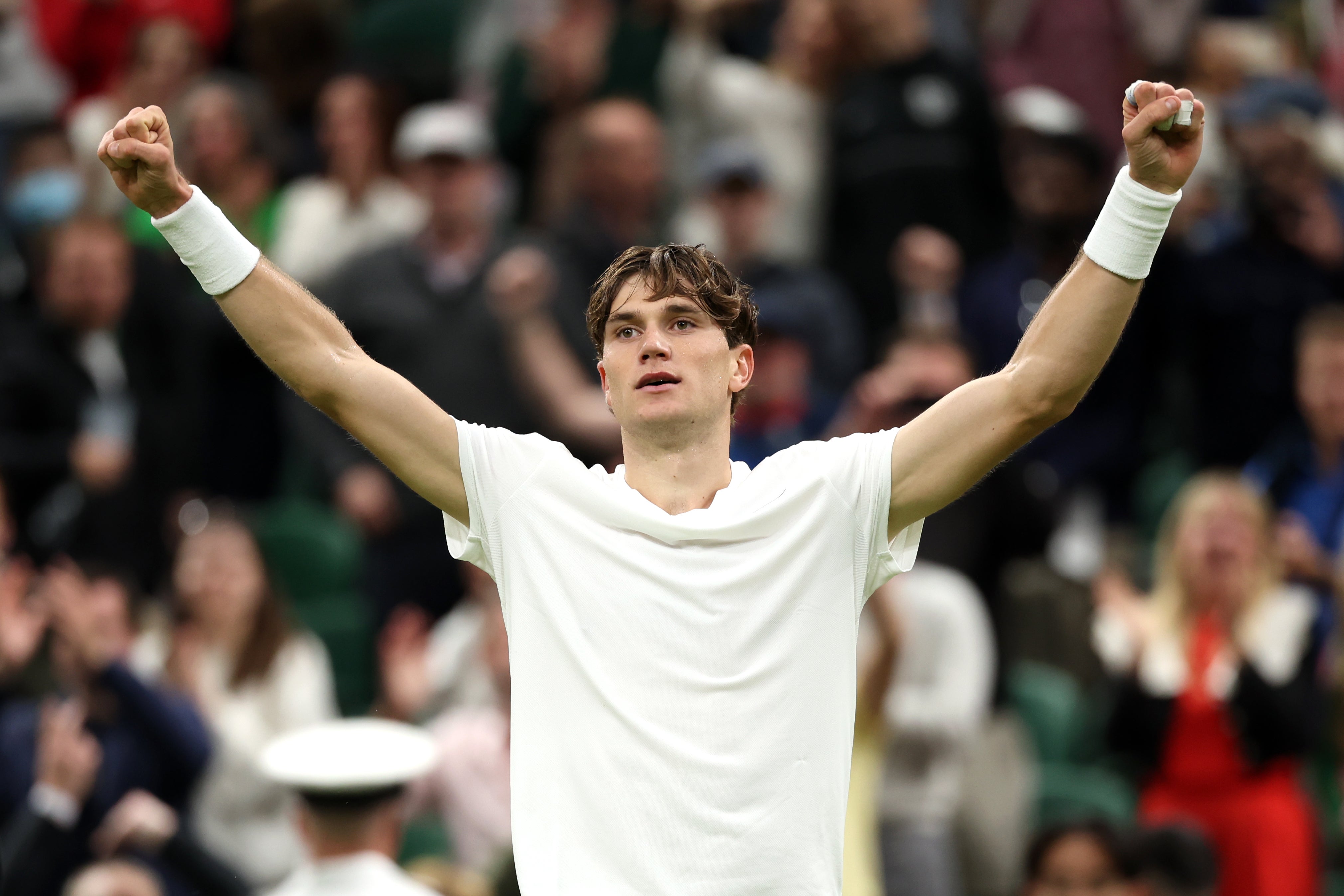 Jack Draper celebrates a five-set win over Elias Ymer