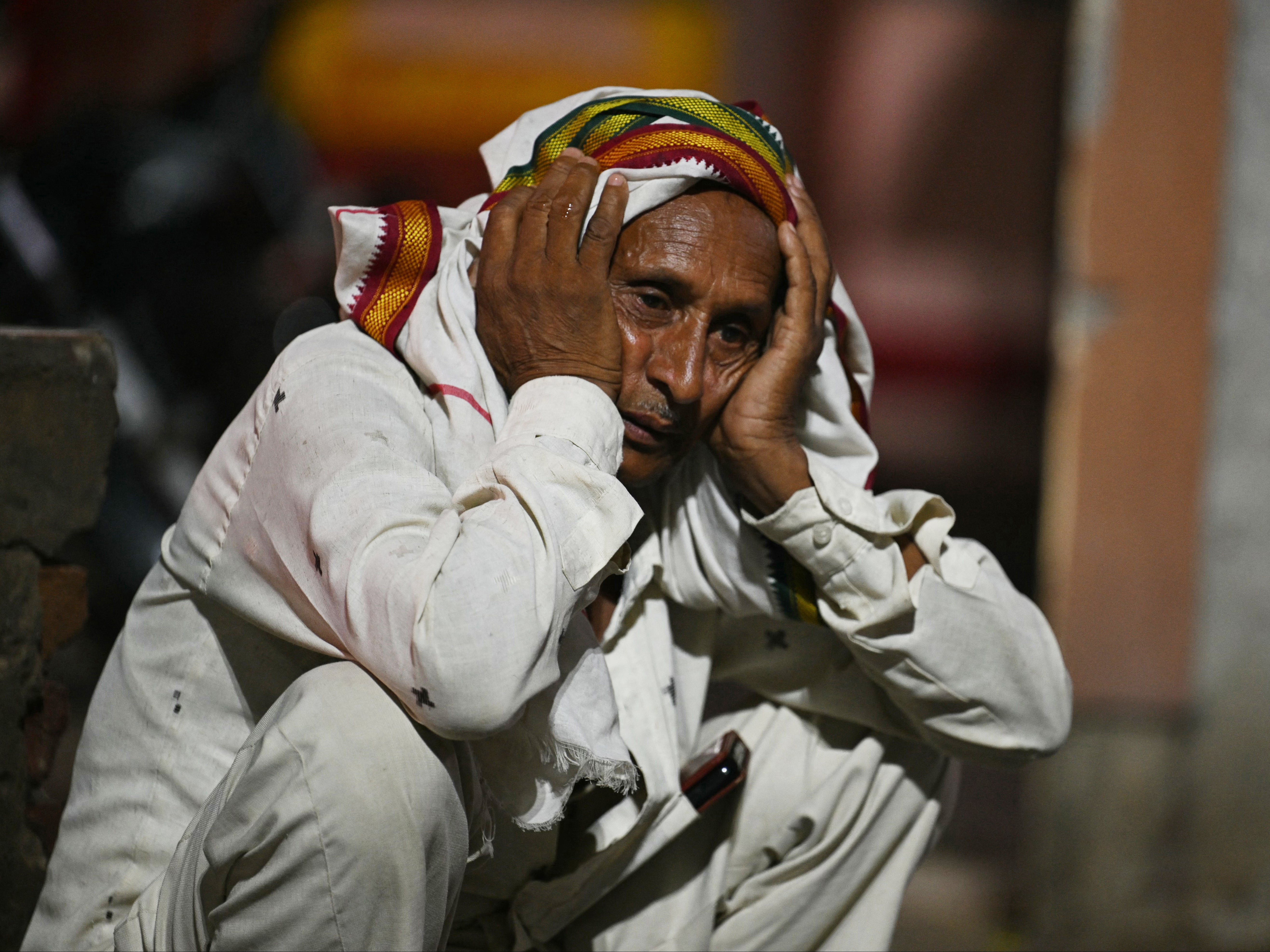 A relative grieves a loved one killed in the Hathras stampede outside a hospital morgue in India’s Uttar Pradesh state on 3 July 2024