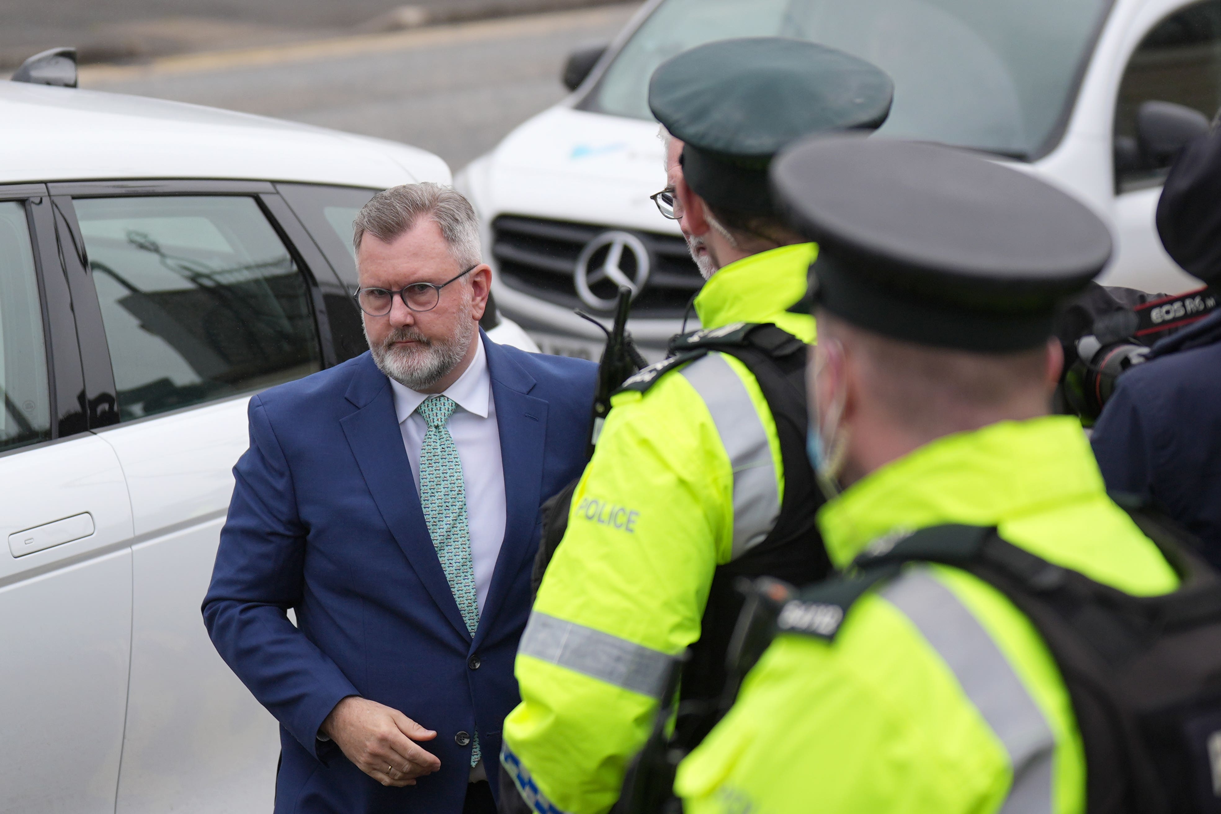 Former DUP leader Sir Jeffrey Donaldson (left) arrives at Newry Magistrates’ Court (Niall Carson/PA)