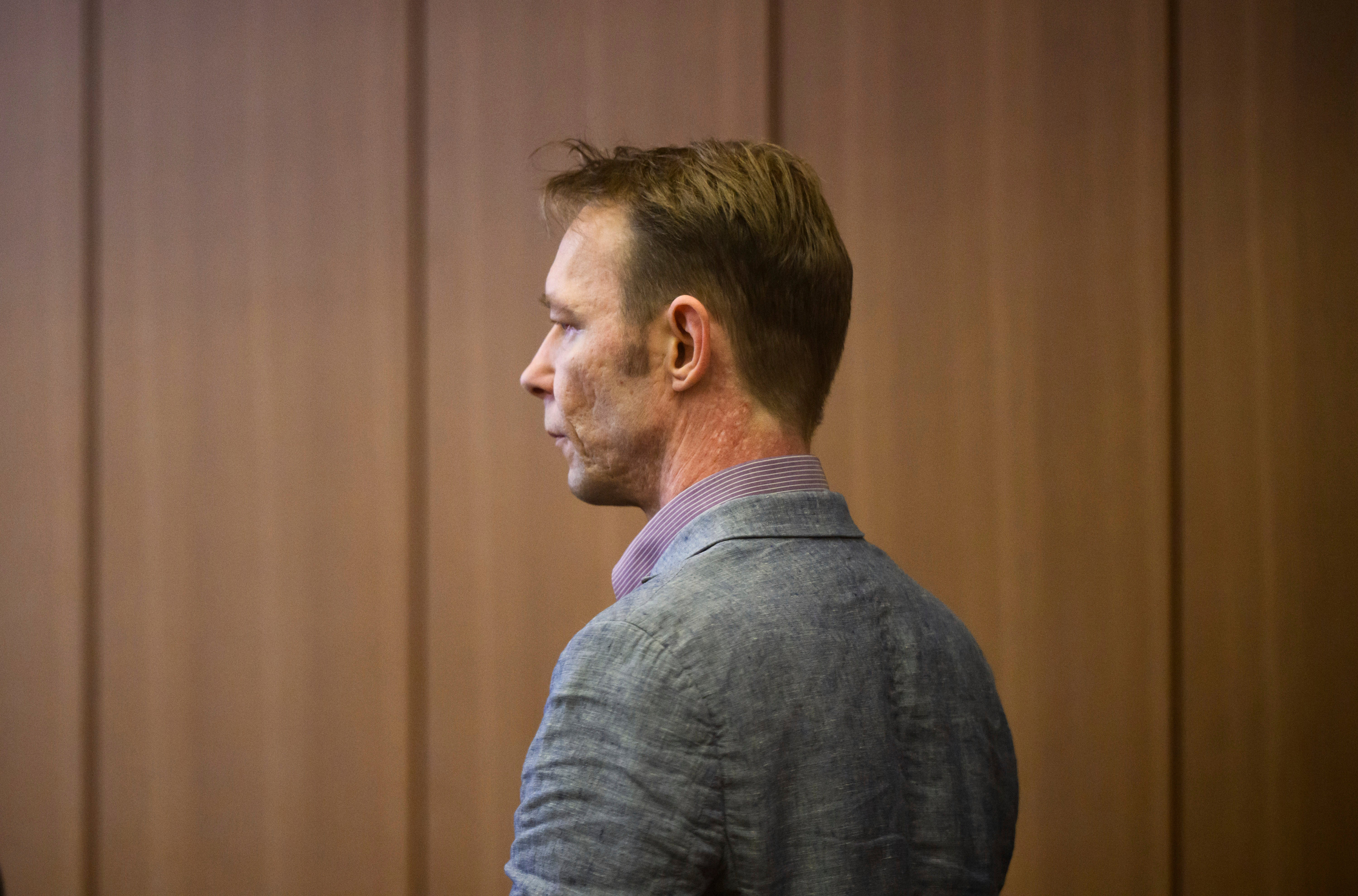 Christian B. arrives at the start of his trial, at Braunschweig district court, in Brunswick