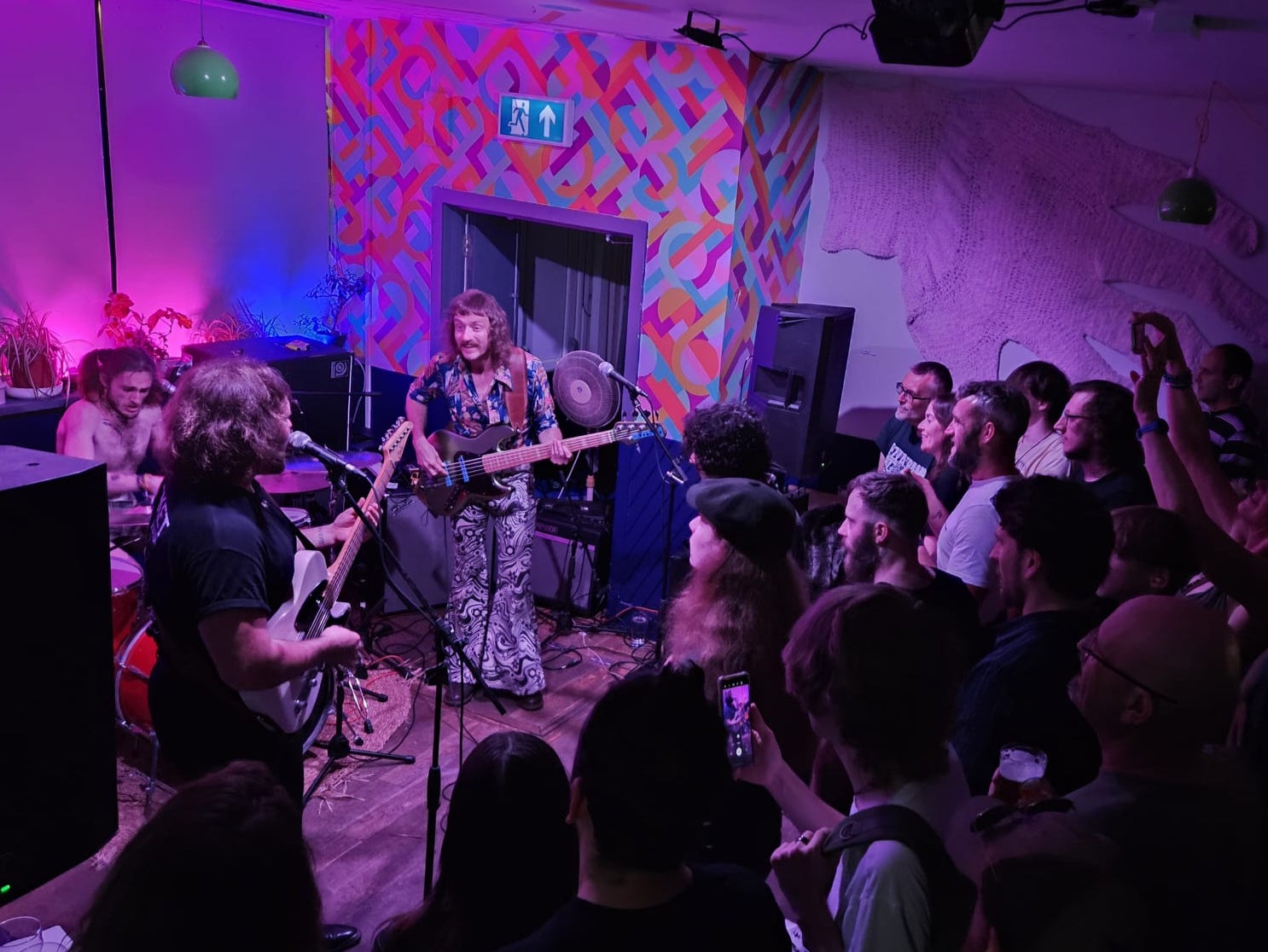 Music fans watch a gig at Elysium in Swansea, Wales