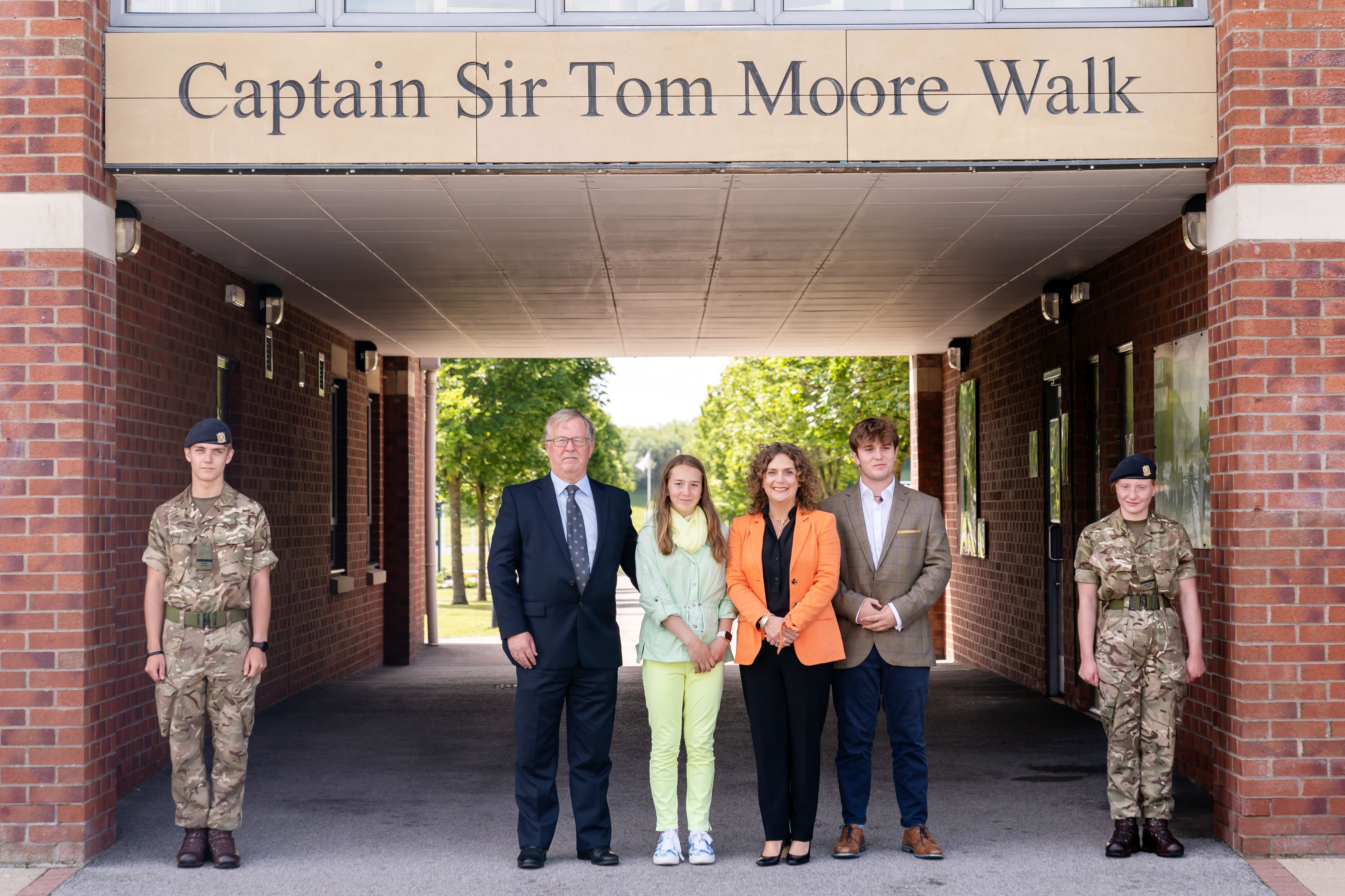 Colin Ingram-Moore (left) and Hannah Ingram-Moore (second from right) have been disqualified as charity trustees (Danny Lawson/PA)