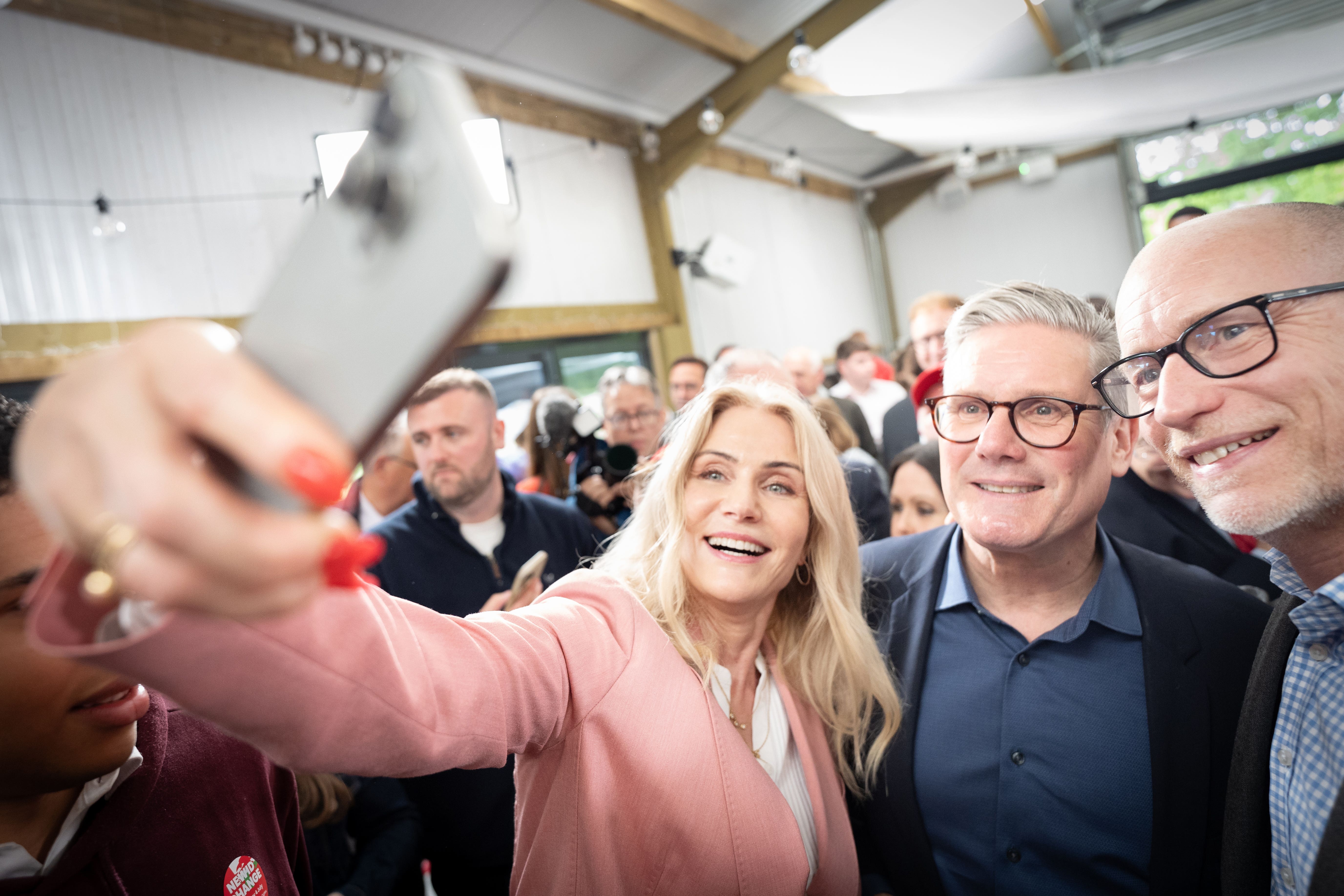 Former Danish Prime Minister Helle Thorning-Schmidt takes a selfie with Labour leader Sir Keir Starmer, who is tipped to win the General Election, on the campaign trail in Wales (Stefan Rousseau/PA)