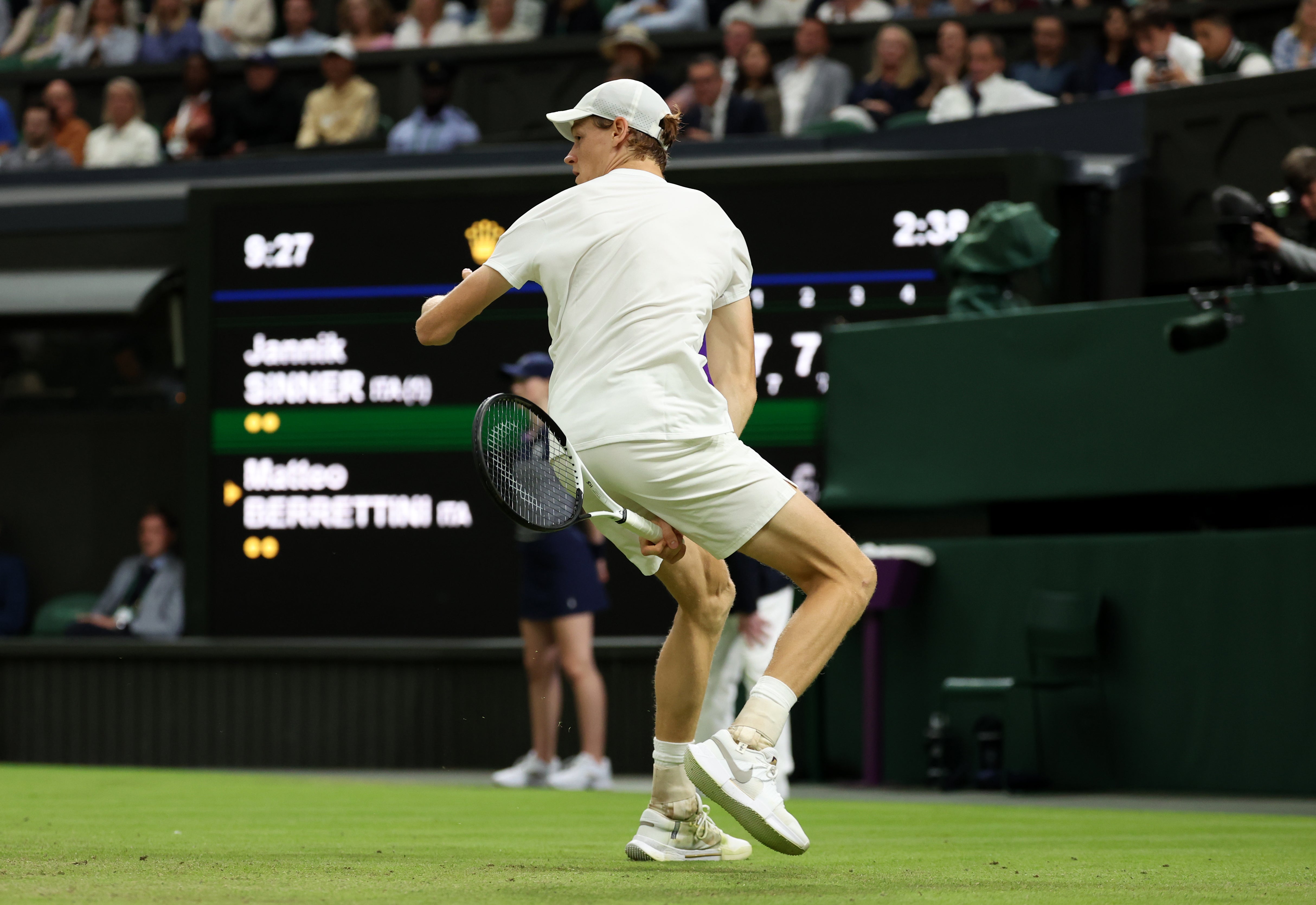 Sinner pulls off a tweener, before Berrettini later plays a shot around the post