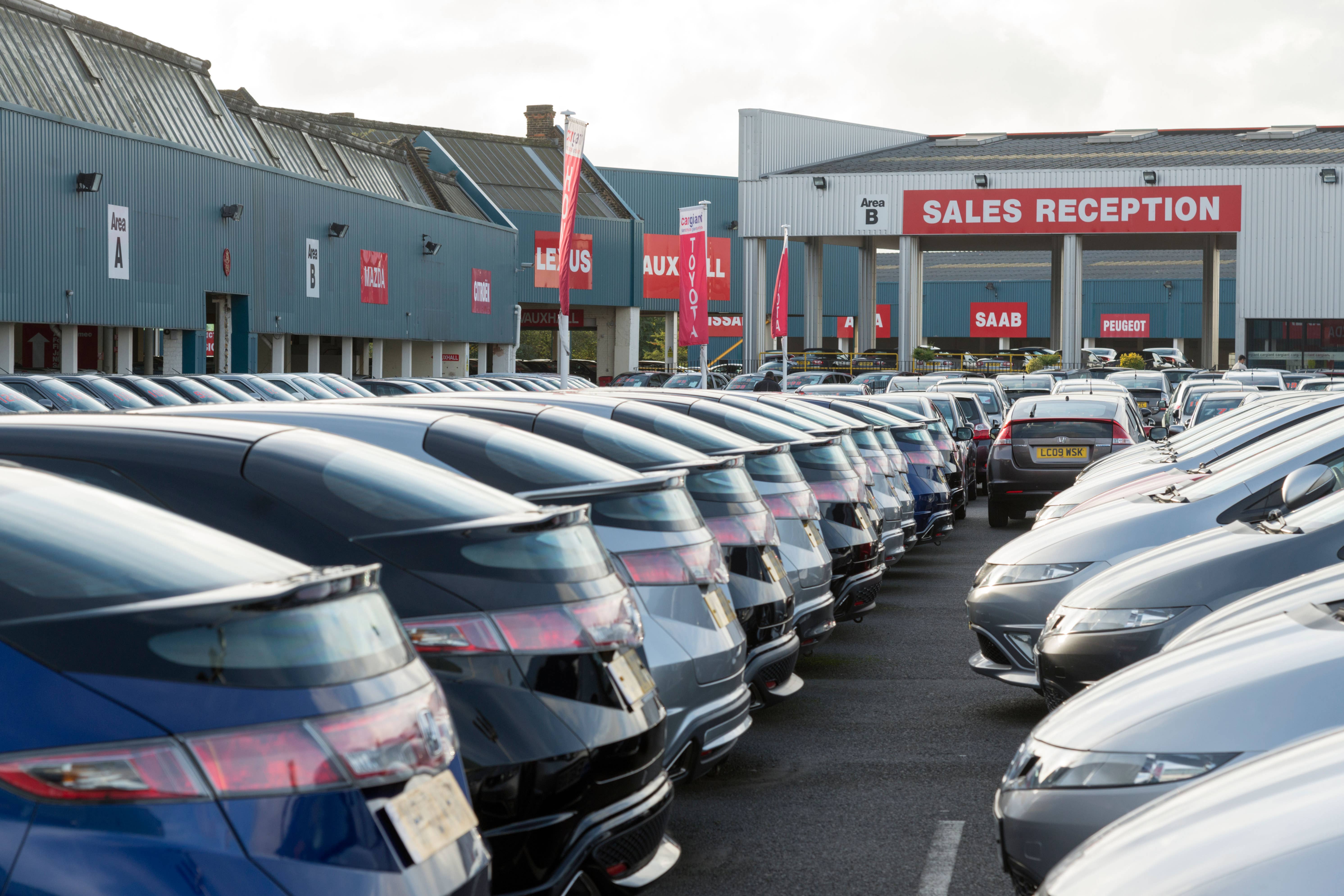 Spending on car purchases has risen three times faster than for public transport journeys, new figures show (Alamy/PA)