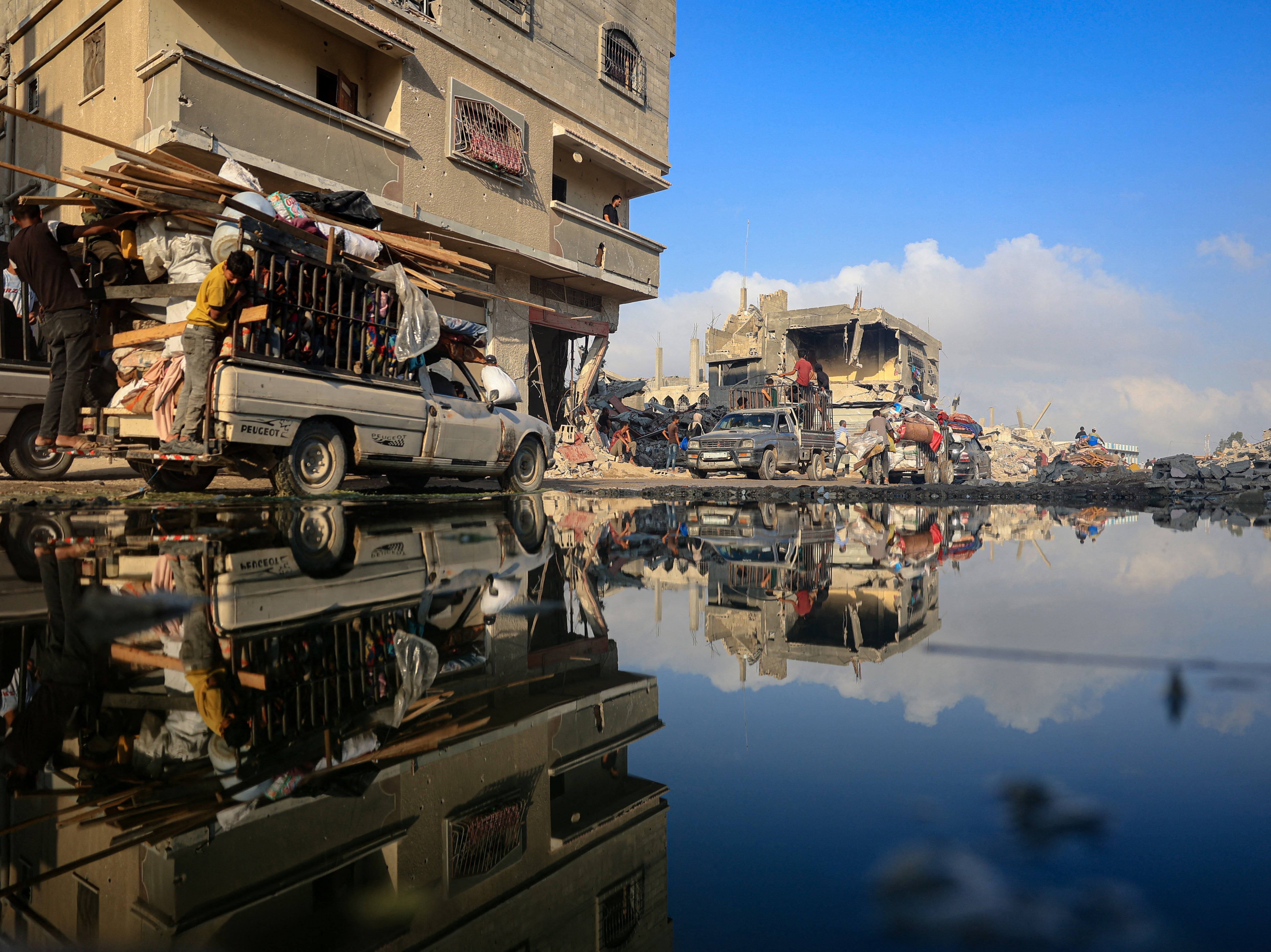 Displaced Palestinians from areas in east Khan Yunis arrive in the city as they flee after the Israeli army issued a new evacuation order for parts of the city and Rafah, in the southern Gaza Strip on 2 July 2024, amid the ongoing conflict between Israel and the Palestinian Hamas militant group