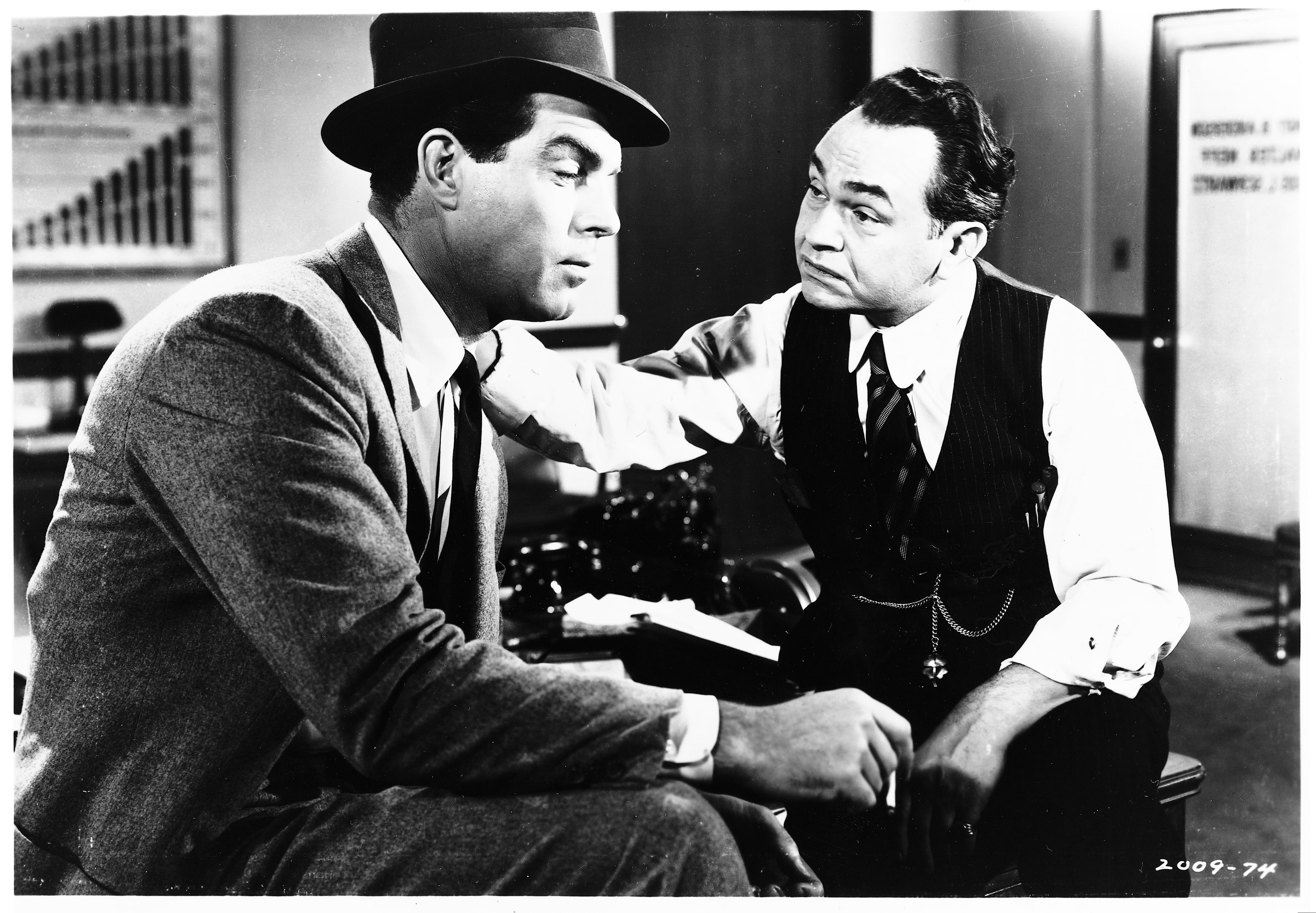 MacMurray as Dietrichson with Edward G Robinson as claims investigator Barton Keyes