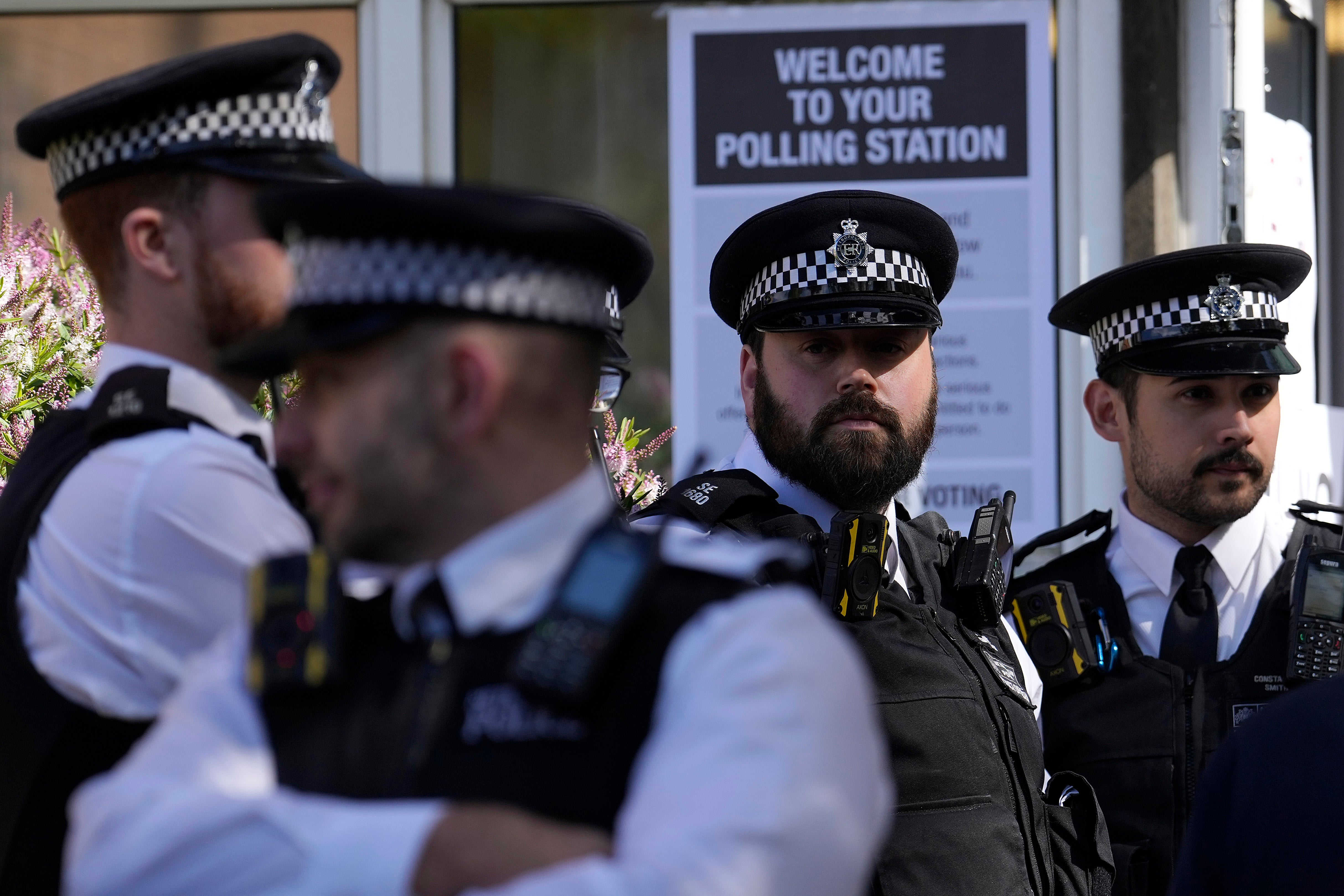 Police officers at a polling station