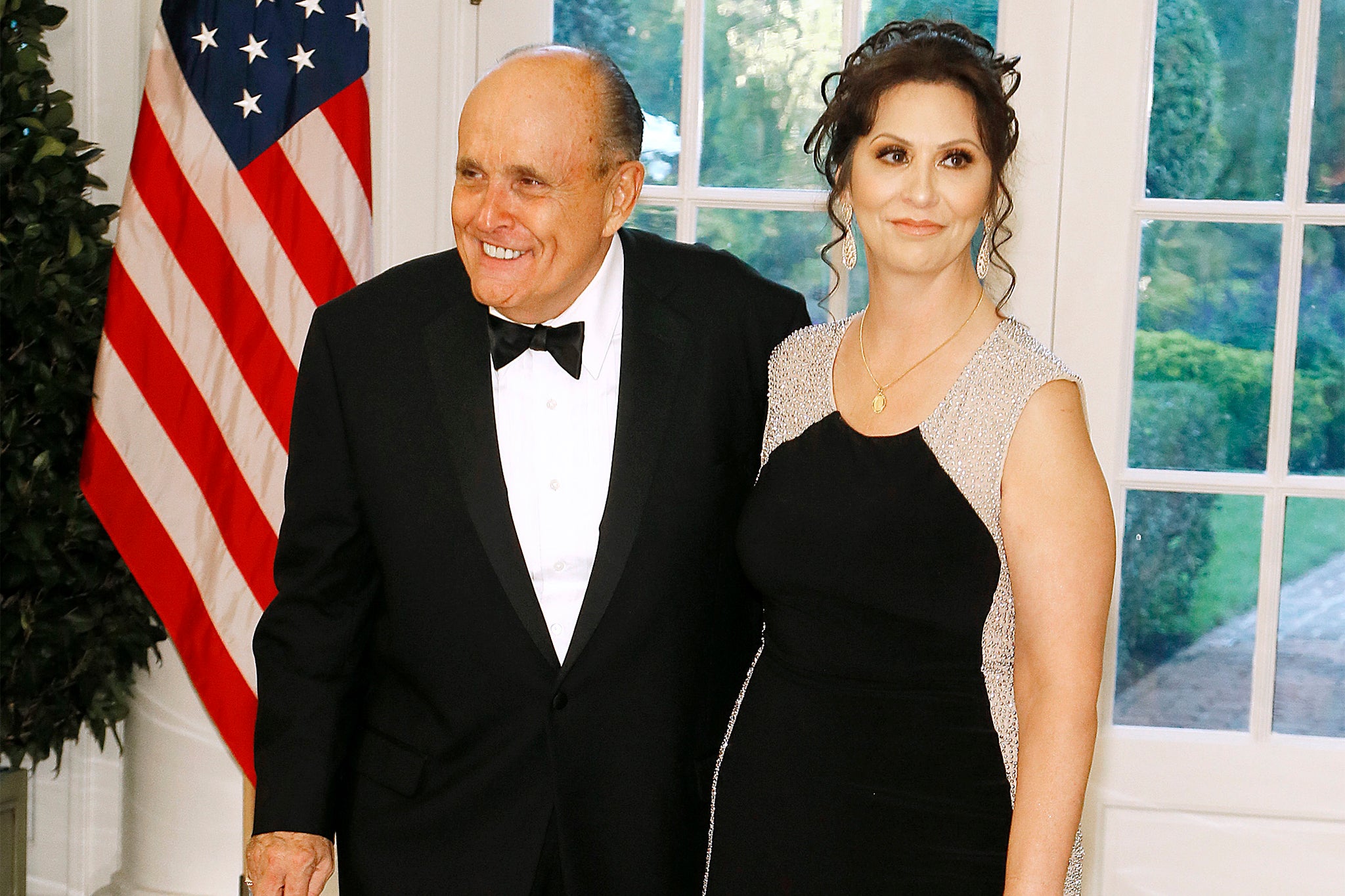 Giuliani and Maria Ryan arrive for a state dinner at the White House in 2019