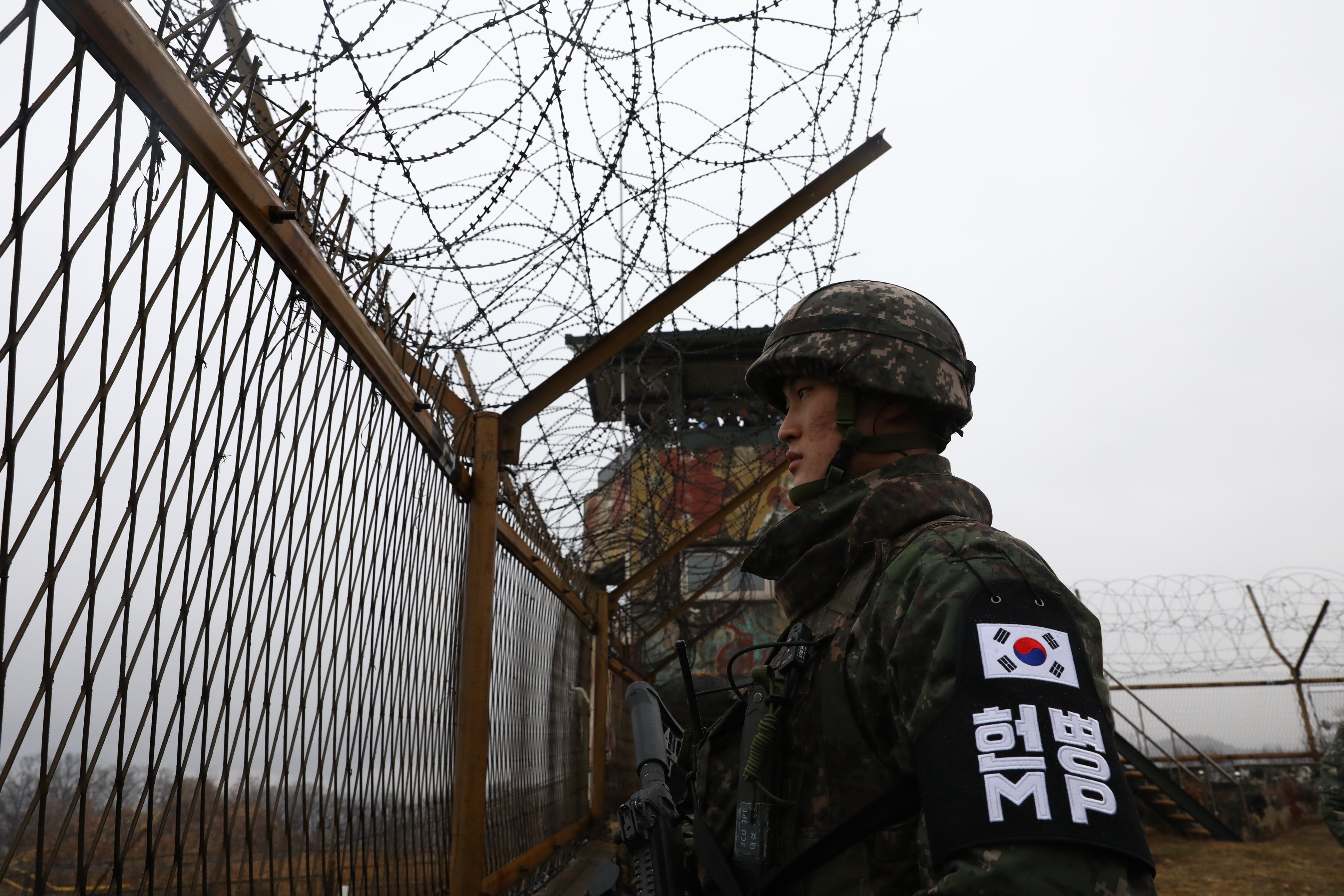 A South Korean soldier guards his post on the border with the North