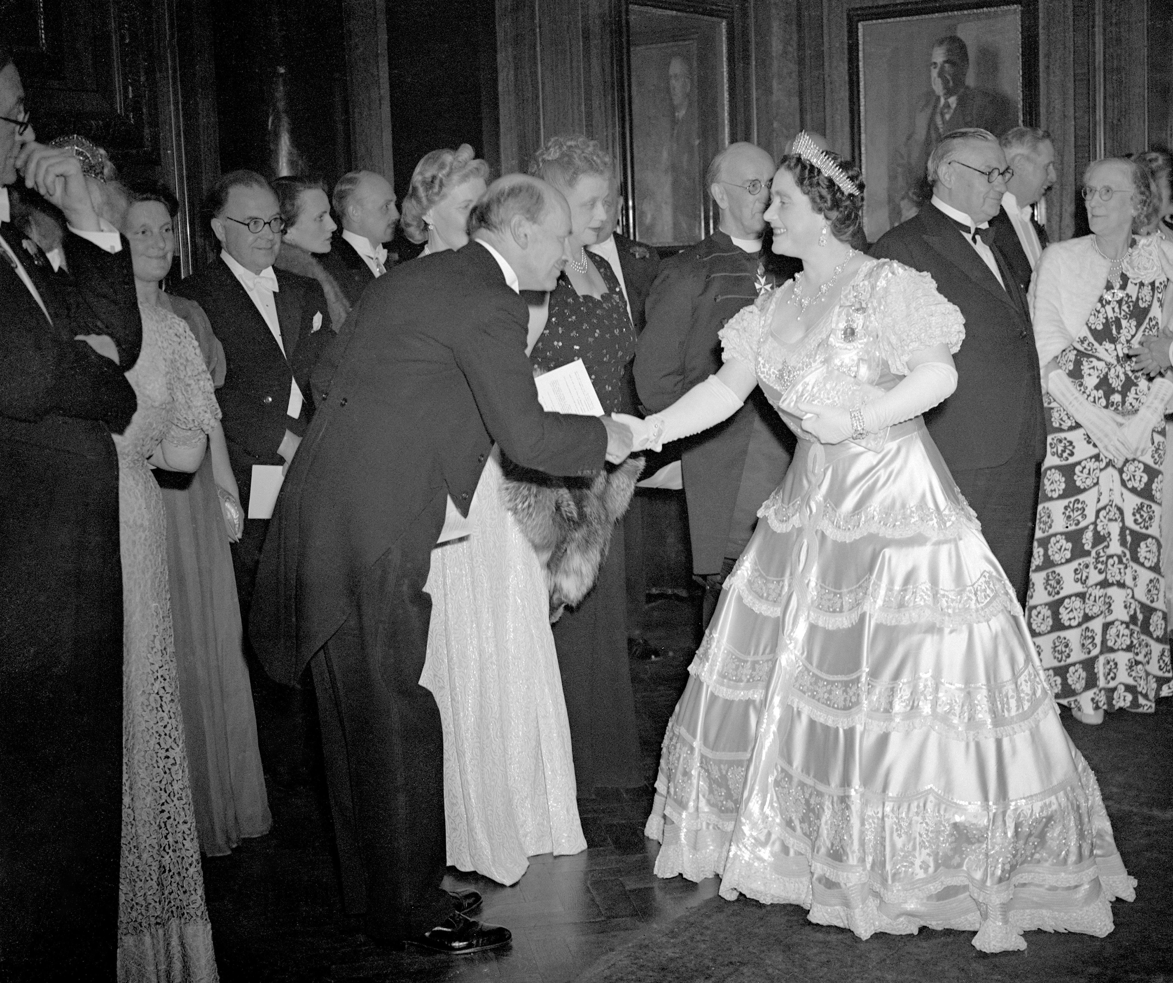 Clement Atlee being presented to the then Queen at a reception in London in 1947