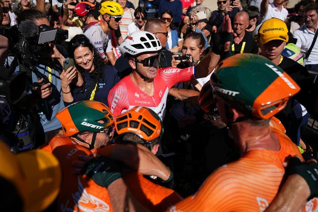 Dylan Groenewegen celebrated victory on stage six of the Tour de France (Daniel Cole/AP)