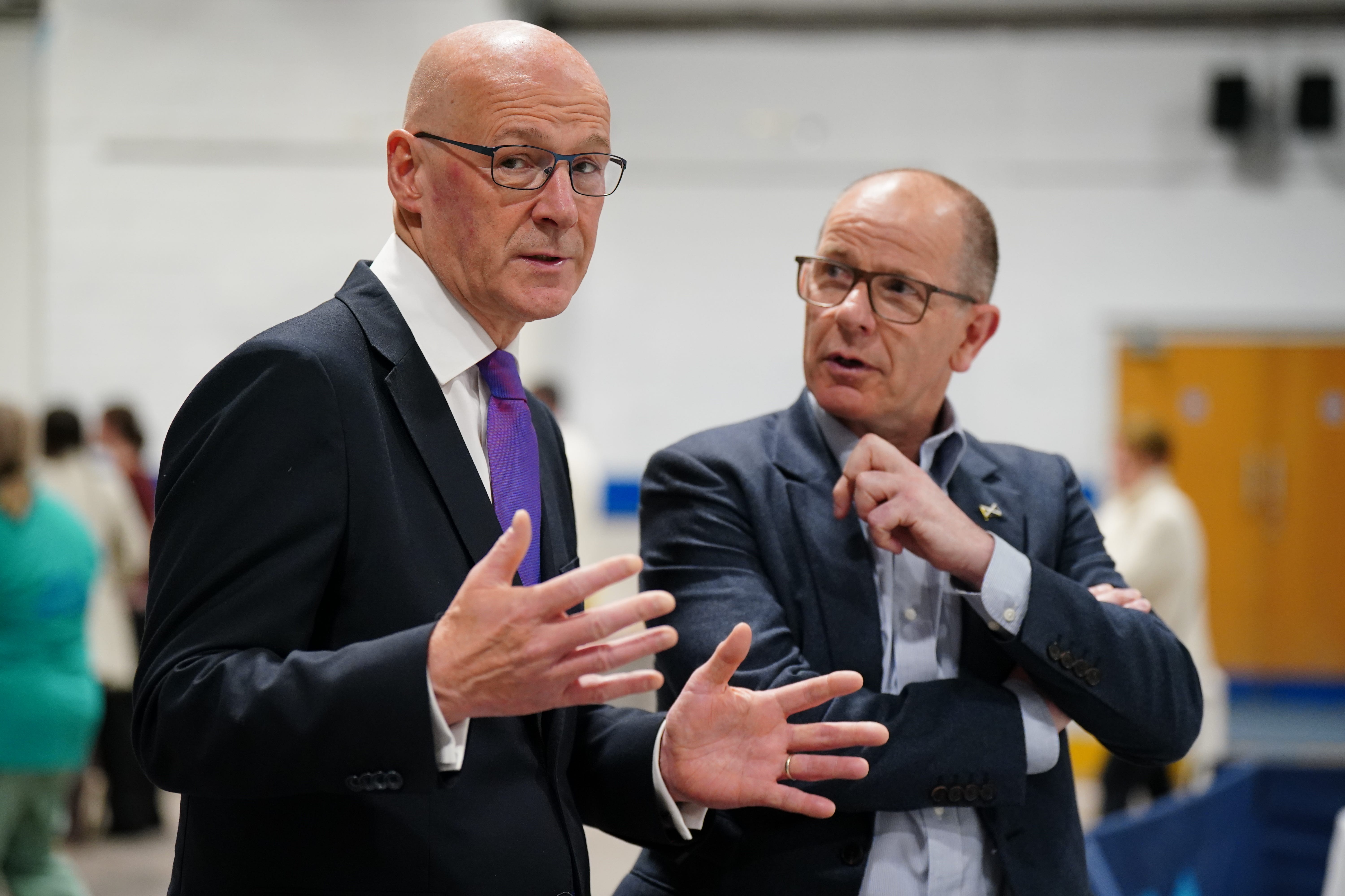 Scottish First Minister and SNP leader John Swinney (left) and MSP Jim Fairlie at Ice Hall in the Dewars Centre, Perth (Jane Barlow/PA)