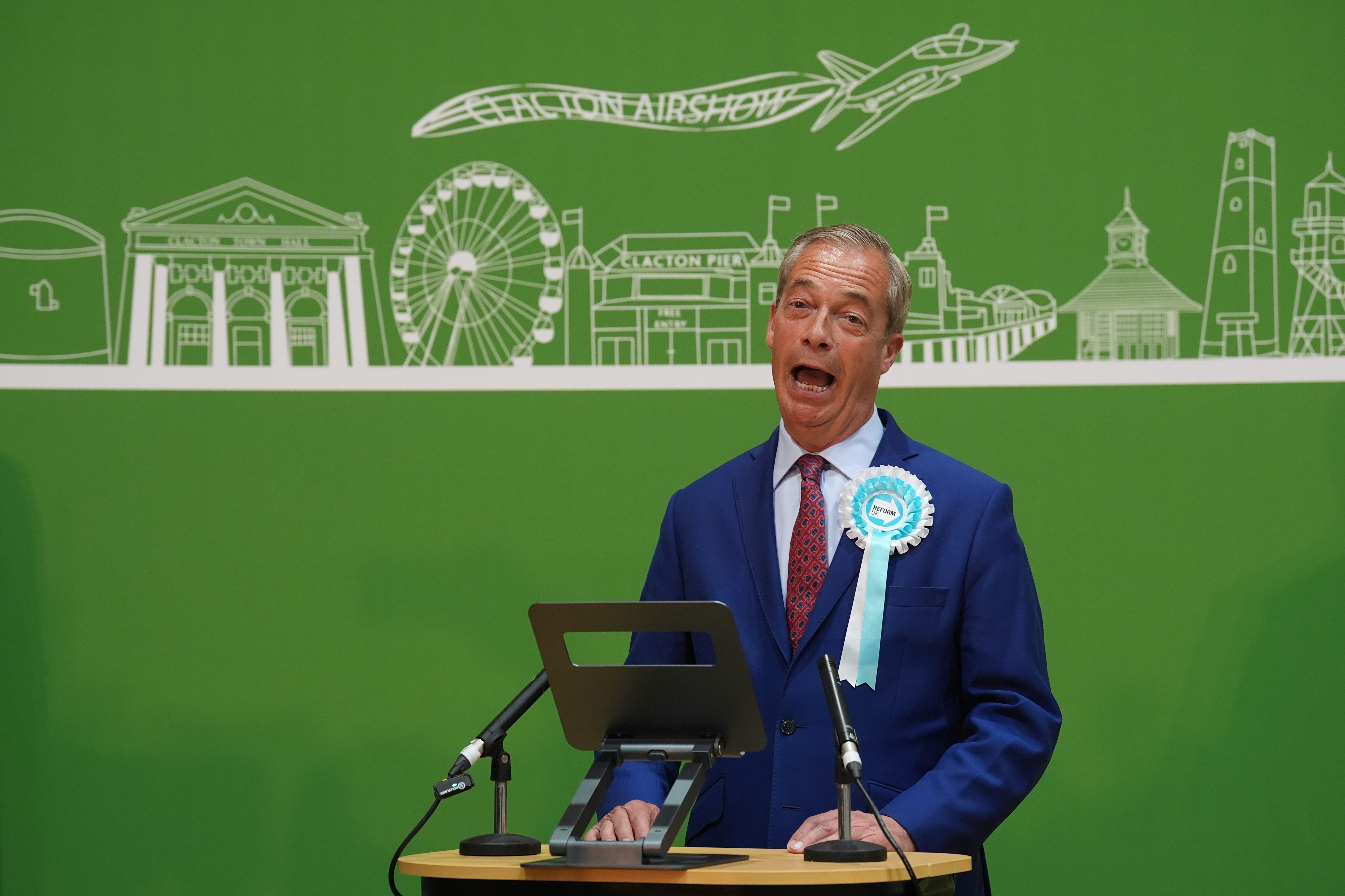 Farage gives a victory speech at Clacton Leisure Centre in Essex (Joe Giddens/PA)