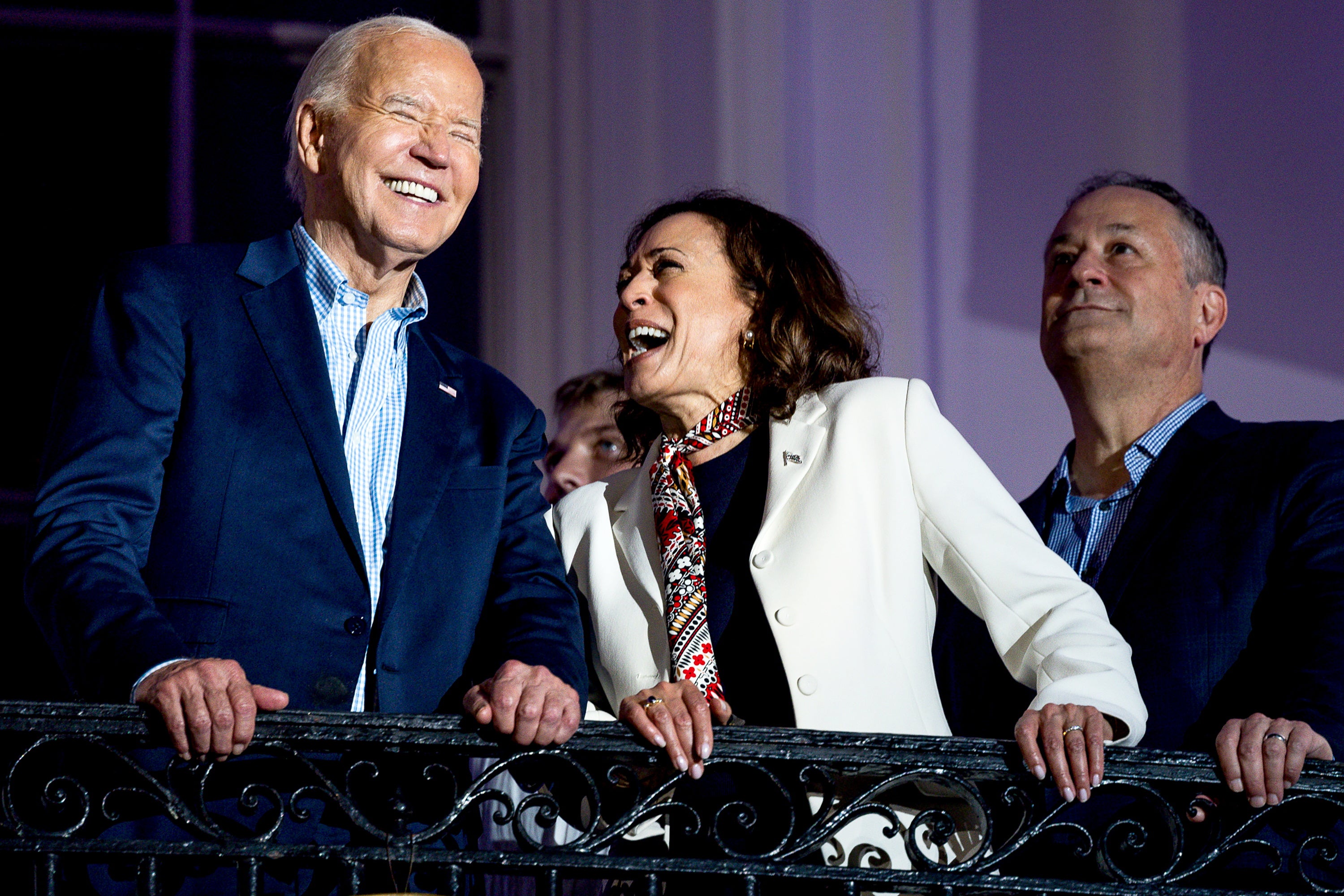 Joe Biden, Kamala Harris and Doug Emhoff together on the White House balcony on July 4