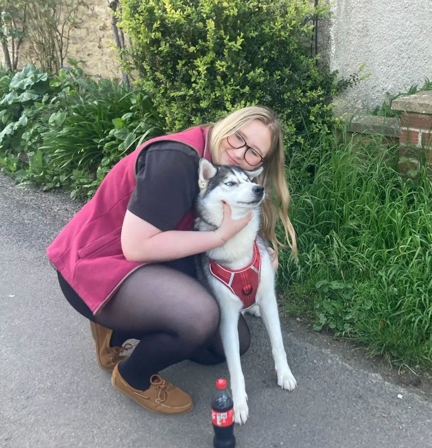 Lizzie with her beloved dog Marlu (Collect/PA Real Life)