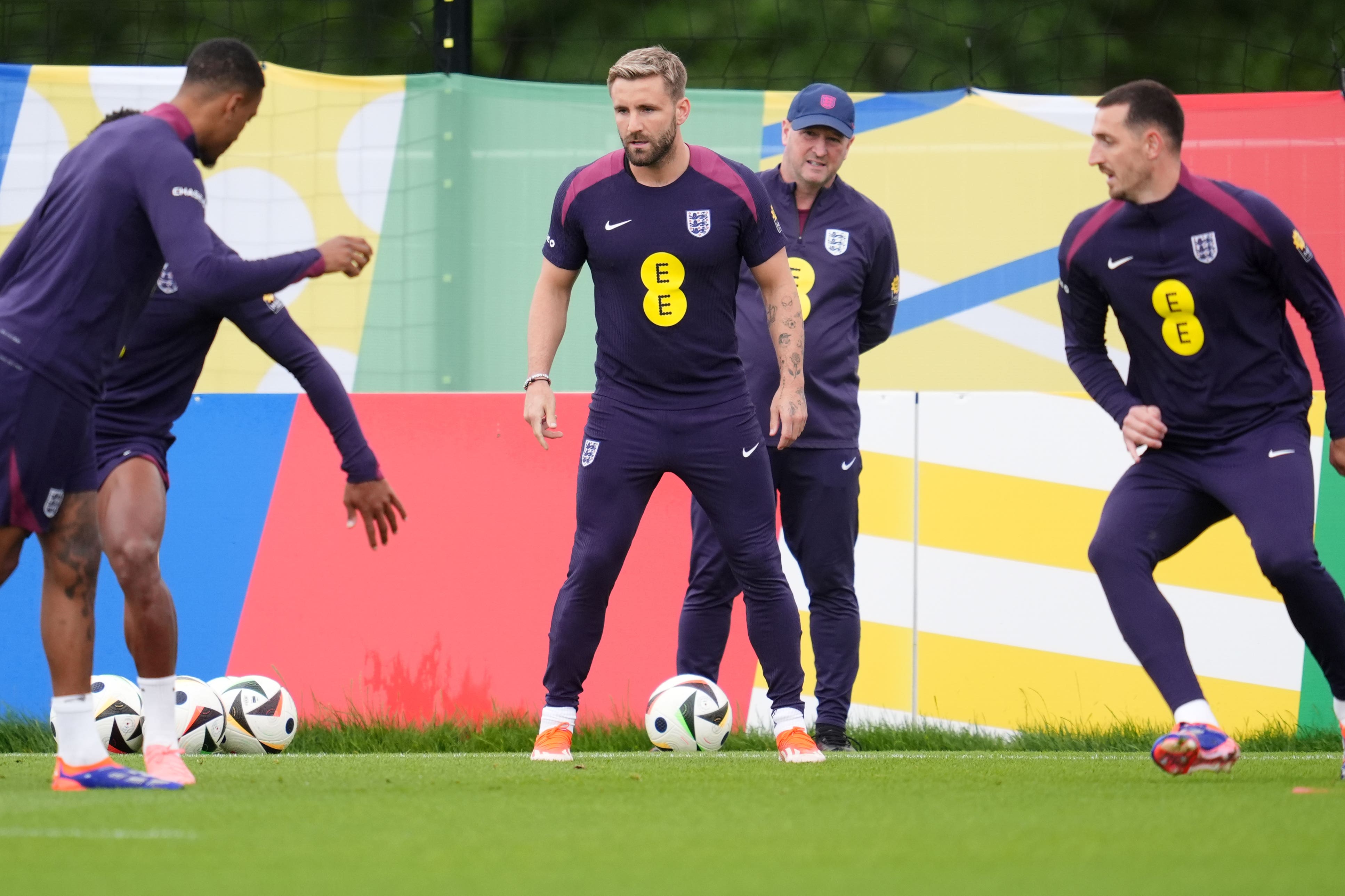 Luke Shaw, centre, has yet to play a minute at Euro 2024 (Adam Davy/PA)