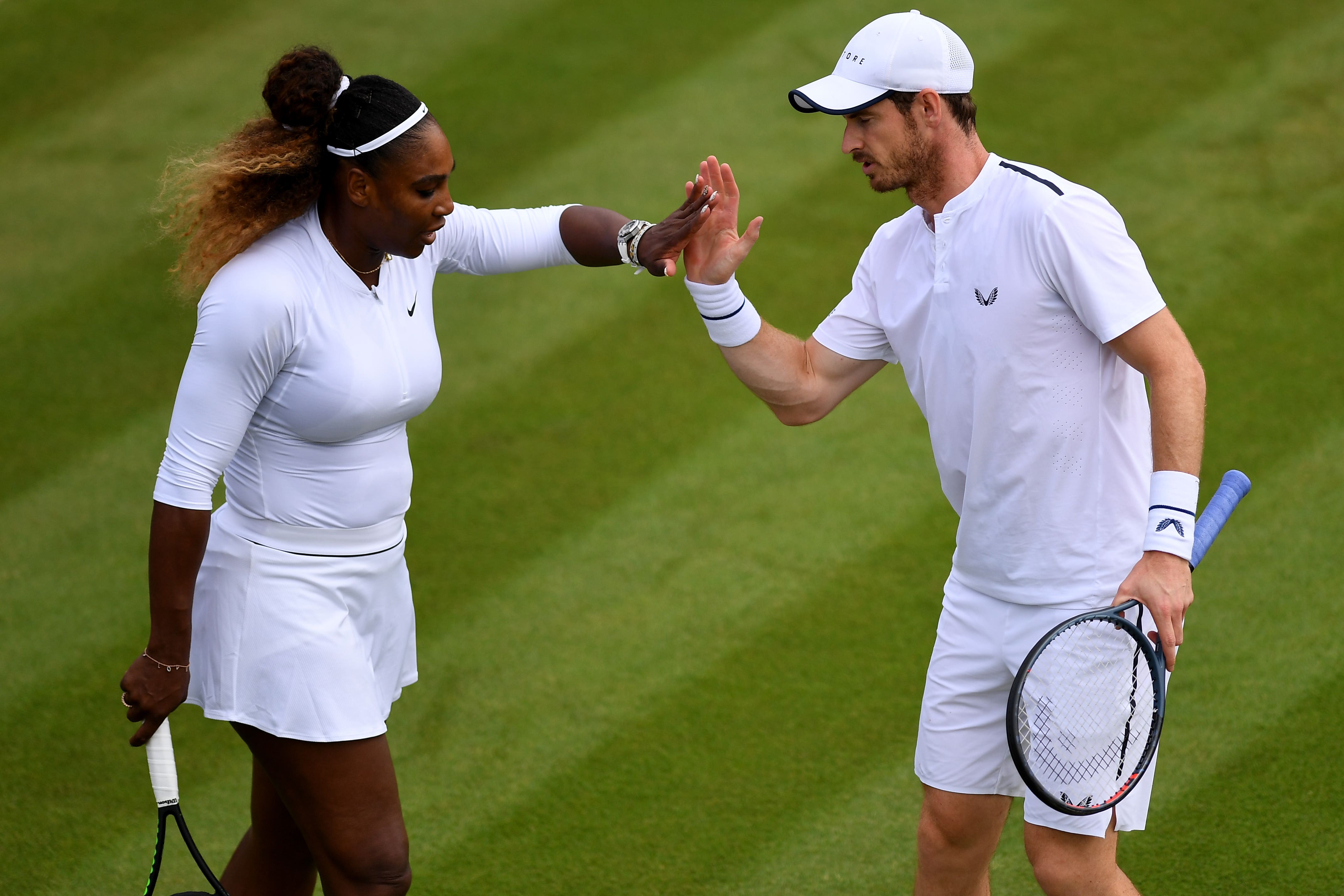 Serena Williams, left, and Andy Murray played mixed doubles at Wimbledon in 2019 (Victoria Jones/PA)