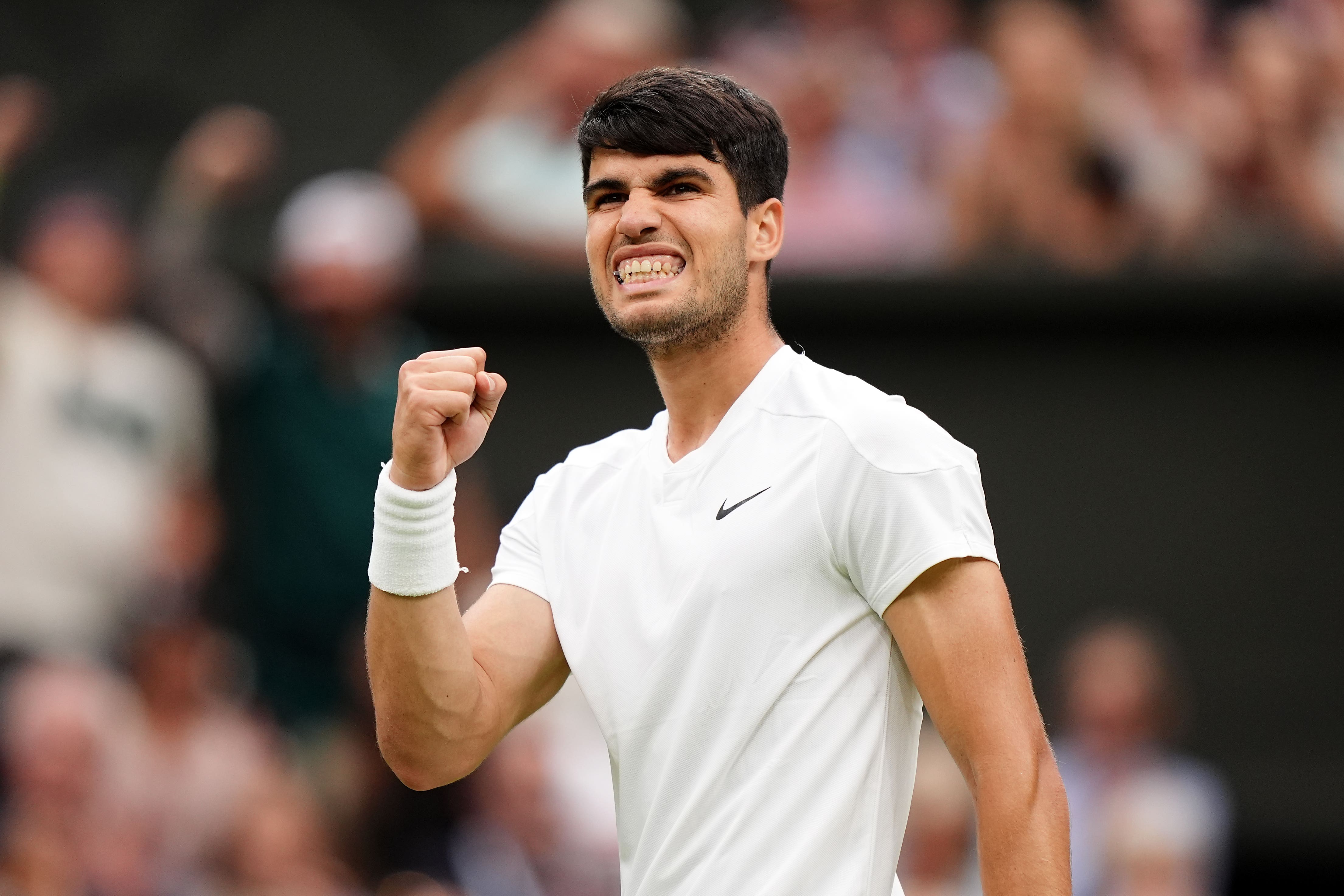 Carlos Alcaraz edged past Frances Tiafoe in five sets (Zac Goodwin/PA)