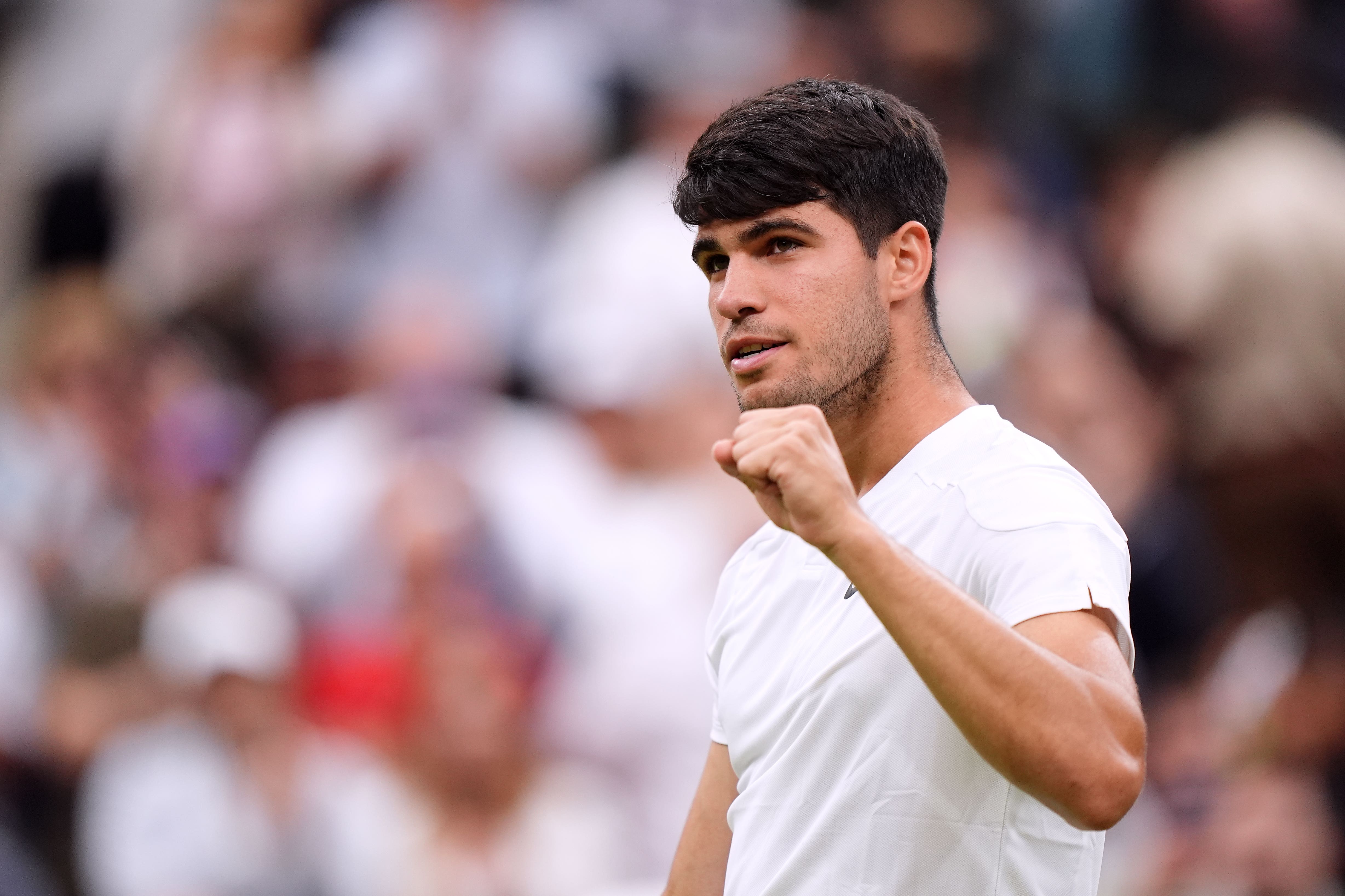 Carlos Alcaraz beat Frances Tiafoe in five sets (Zac Goodwin/PA)