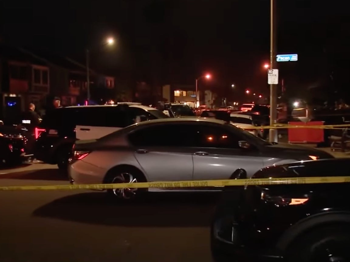 Huntington Beach Police at the taped-off scene of a fatal Fourth of July stabbing in Huntington Beach, California. The stabbing left two people dead and three others injured. A suspect was taken into custody at the scene