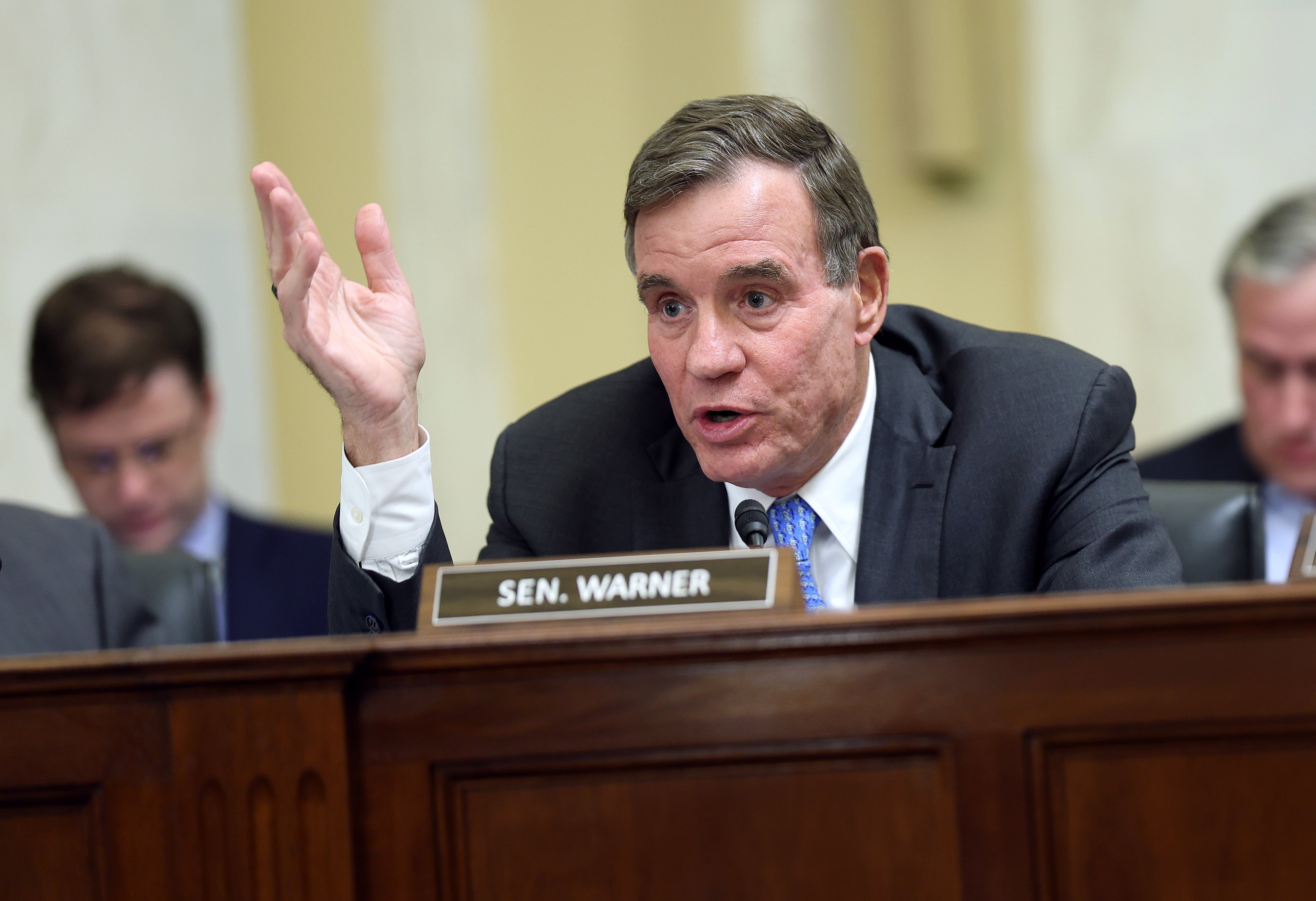 U.S. Sen. Mark Warner delivers remarks during a Rules Committee hearing. Warner is one of the senators reportedly looking for President Joe Biden to step aside