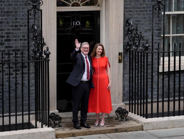 <p>Sir Keir Starmer and his wife Victoria outside No 10 Downing Street (Gareth Fuller/PA)</p>