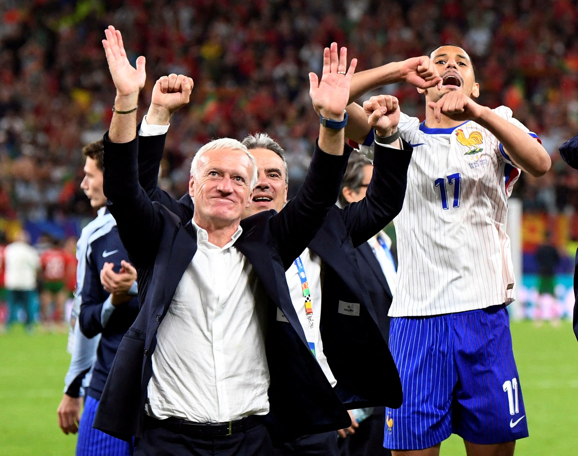 France coach Didier Deschamps celebrates with William Saliba