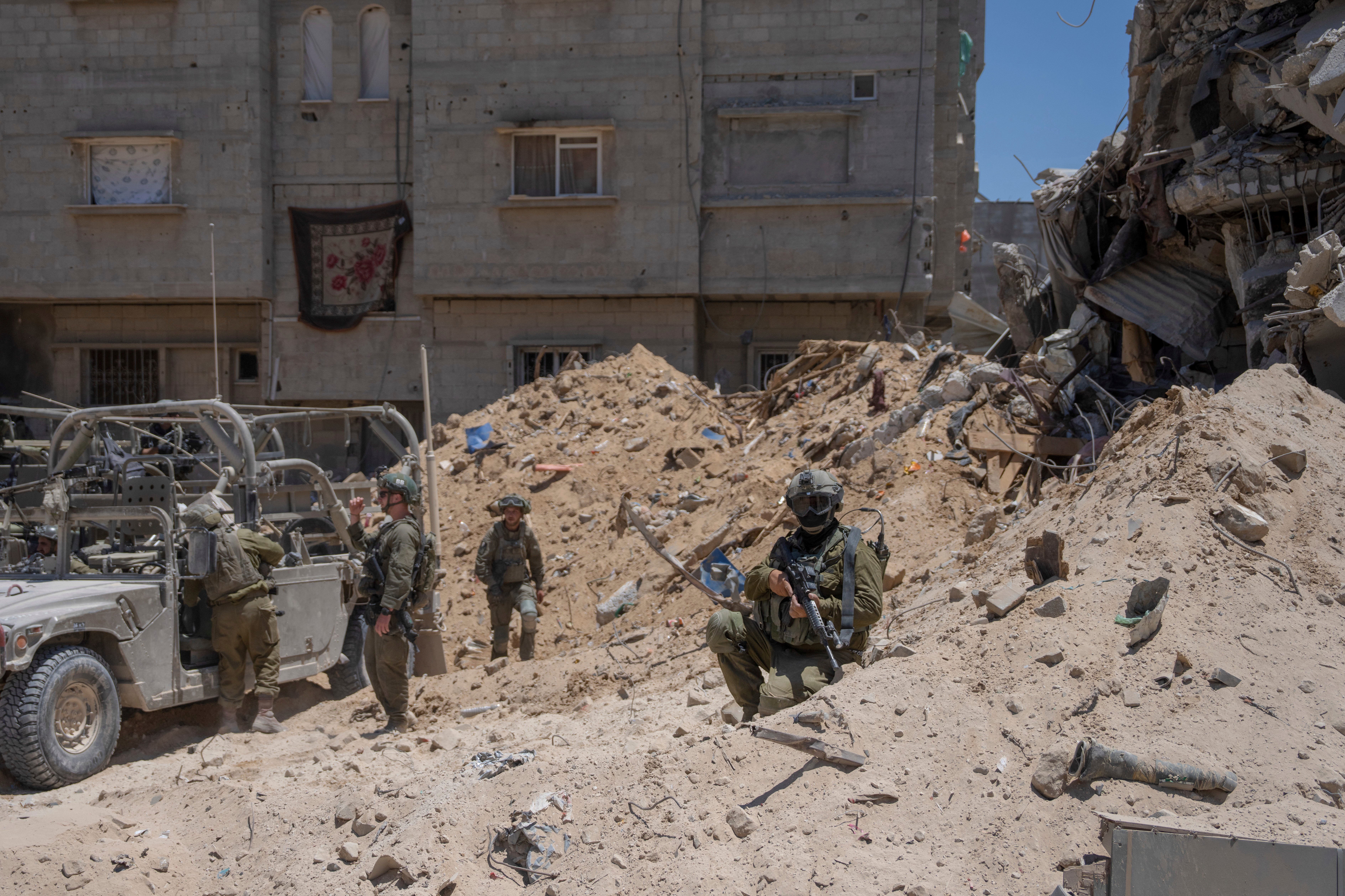 Israeli soldiers gather in the southern Gaza Strip, Wednesday, July 3, 2024