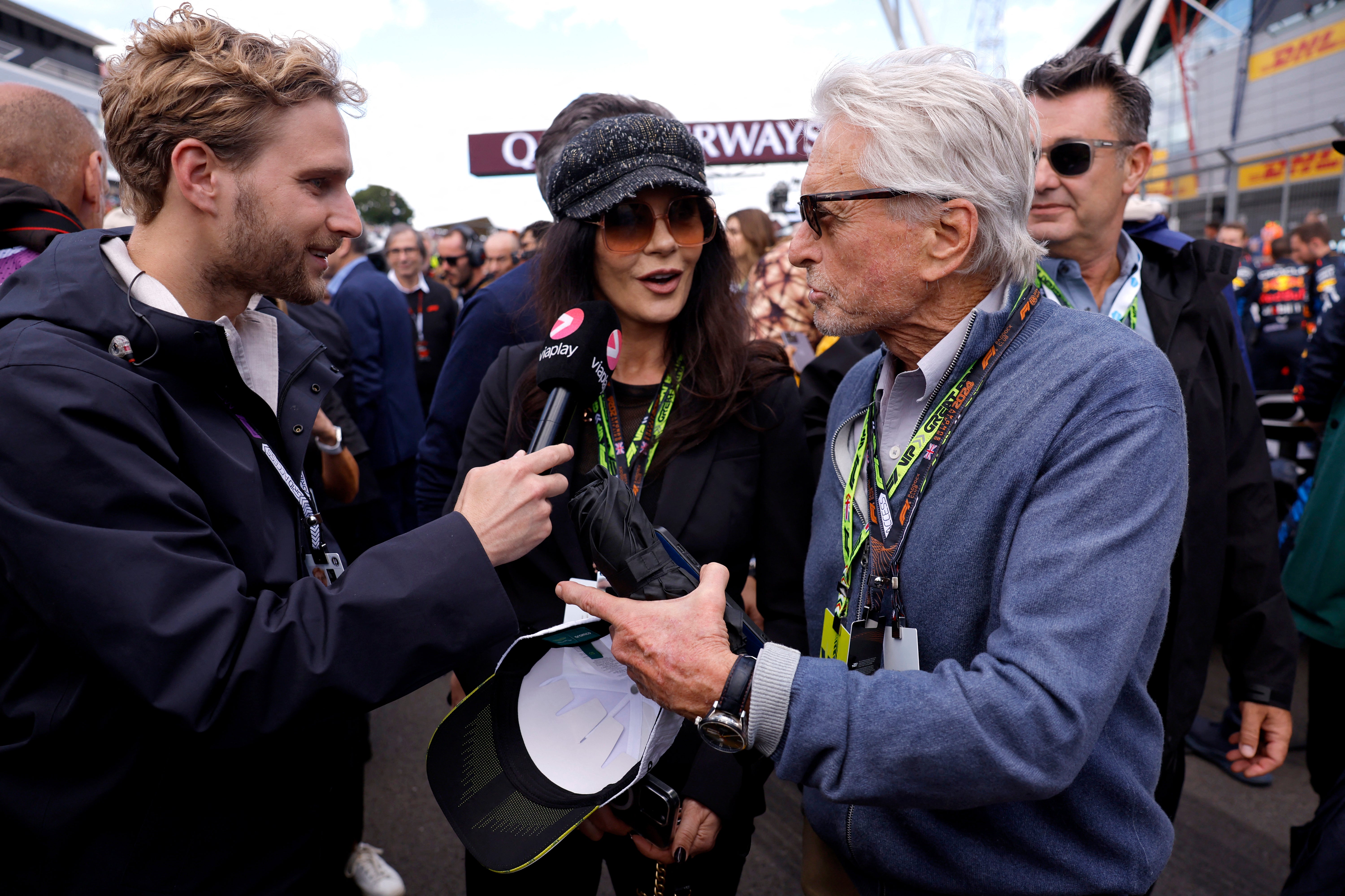 Michael Douglas and Catherine Zeta Jones speak on the grid