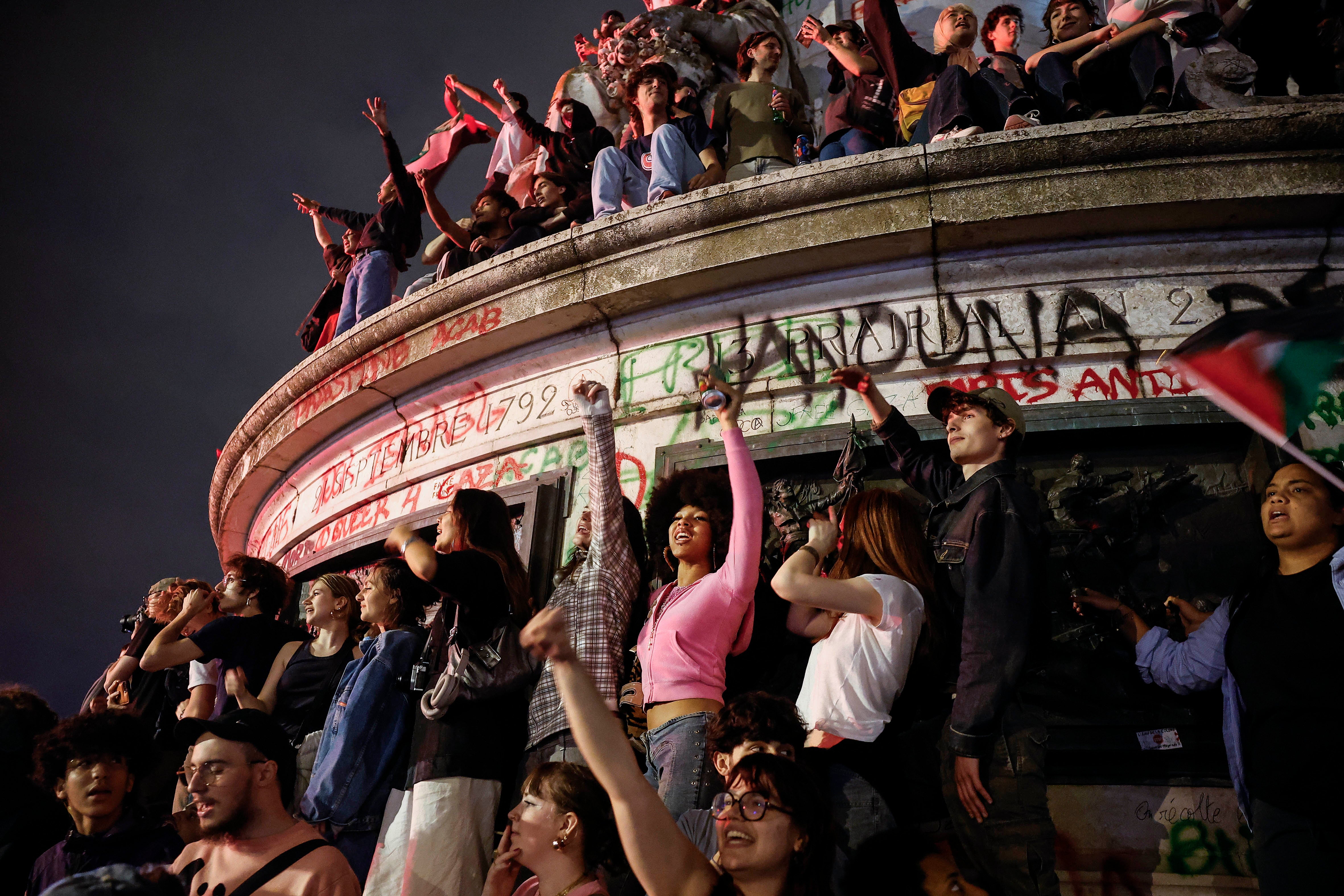 People react after the second round of the French legislative elections results at Place de la Republique in Paris, France, 07 July 2024