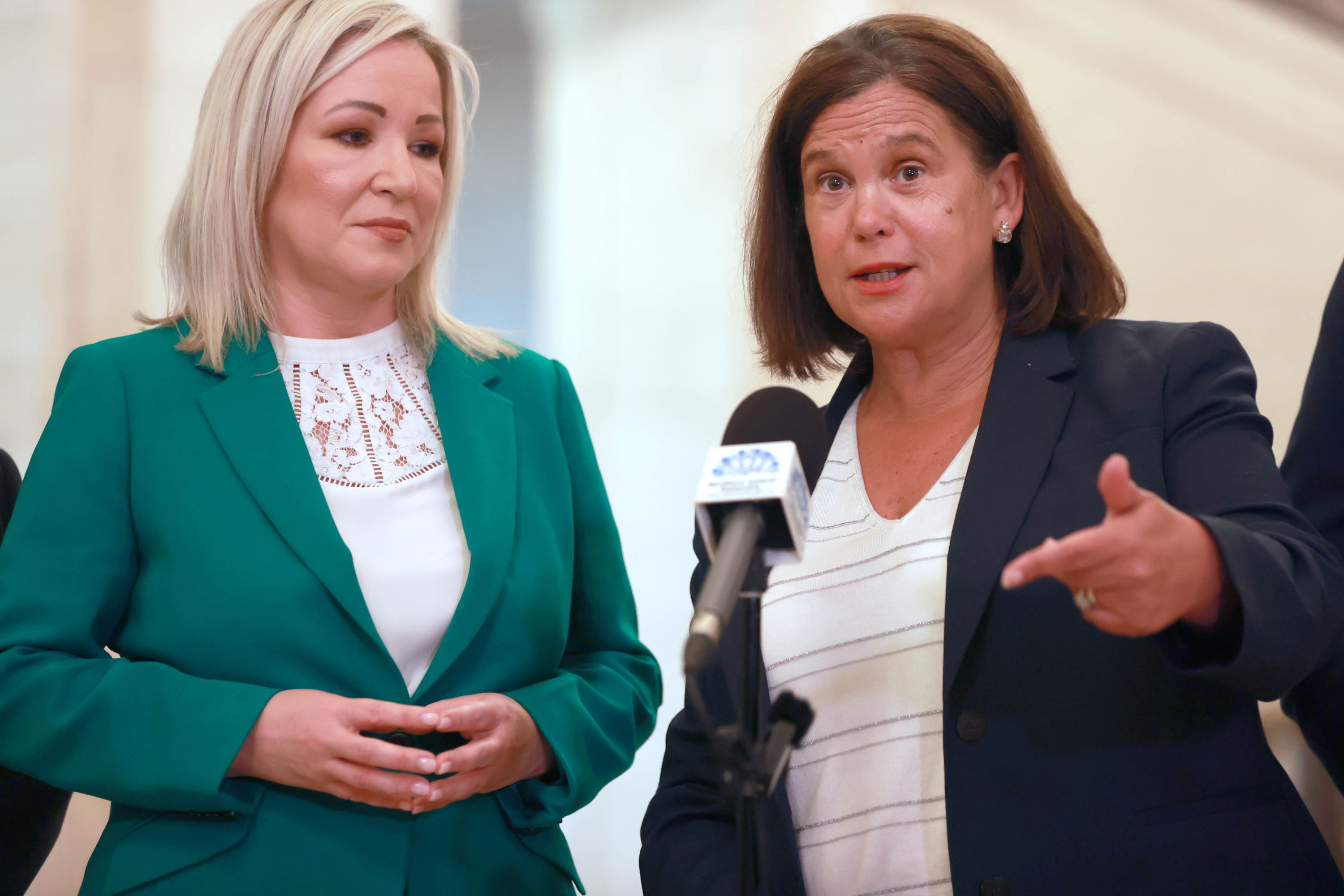 First Minister of Northern Ireland Michelle O’Neill and Sinn Fein’s President Mary Lou McDonald (right), address the media in the Great Hall of Parliament Buildings at Stormont, Belfast, following a meeting with Prime Minister Sir Keir Starmer (Liam McBurney/PA)