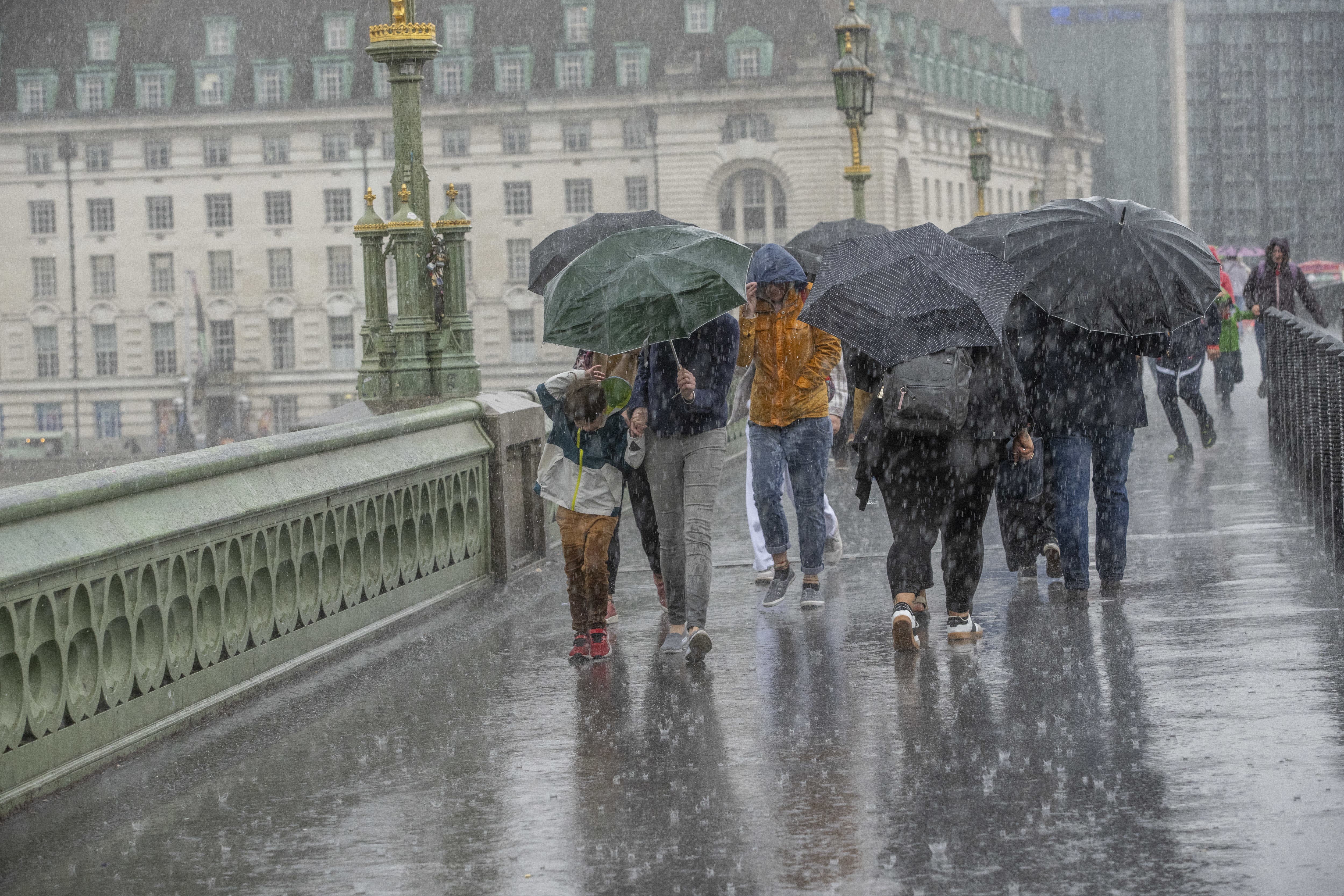 A Met Office spokesperson advised those caught in storms not to use umbrellas or phones (Jeff Moore/PA)