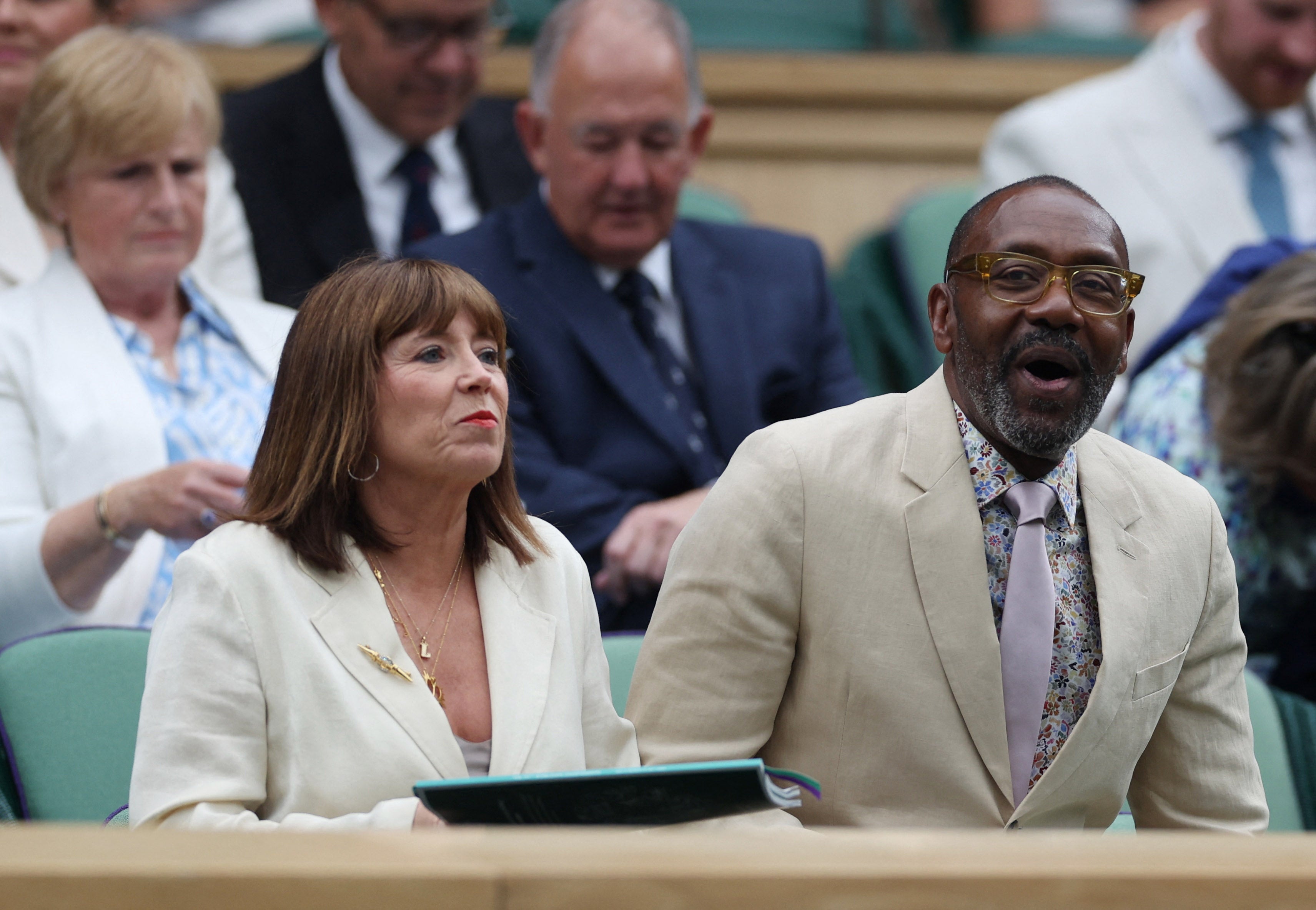 Henry was joined by his wife Lisa Makin at Wimbledon on day eight