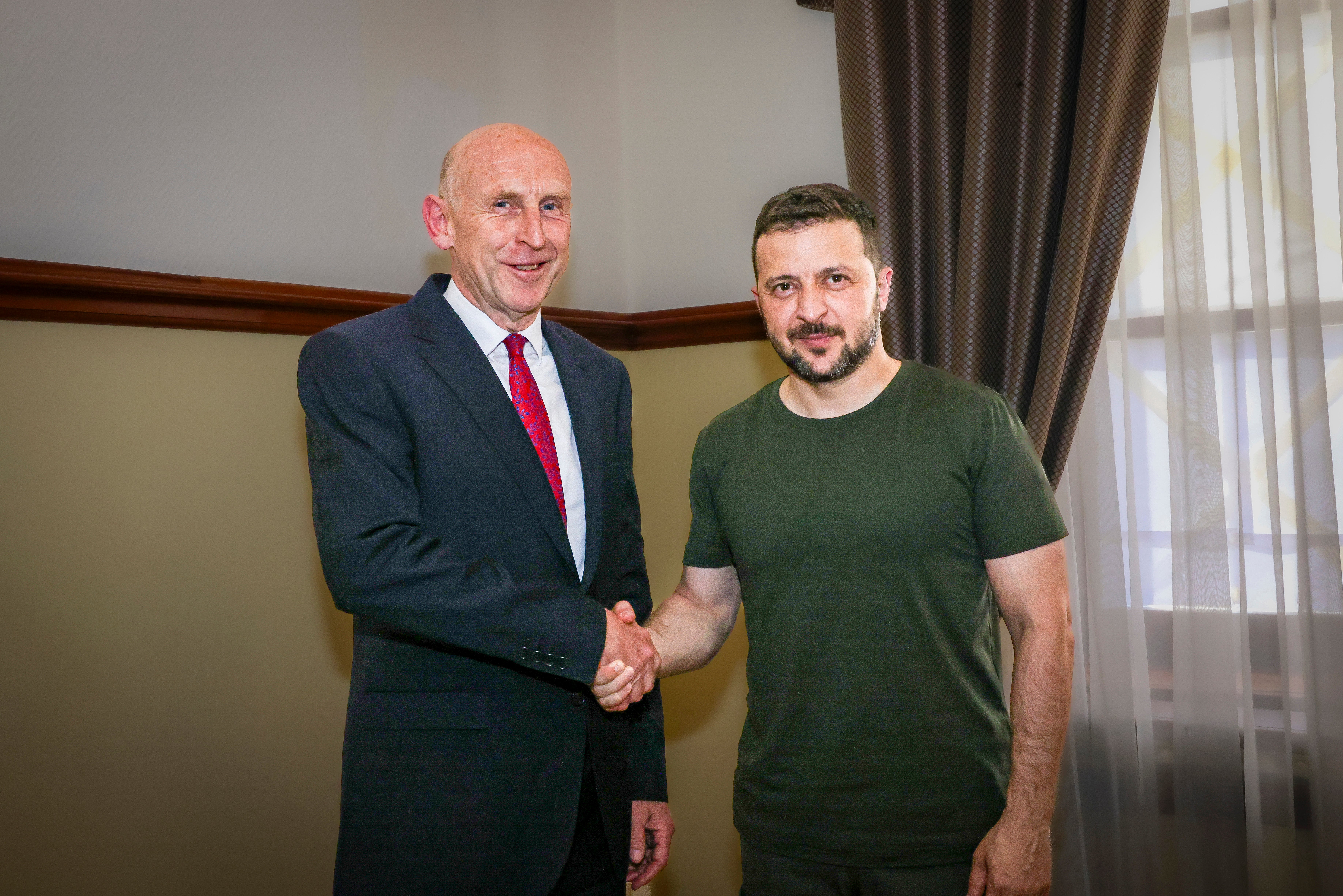 Britain’s Secretary of State for Defence, The Rt Hon John Healey, MP, left, shakes hands with Ukrainian President Volodymyr Zelensky, in Odesa, Ukraine