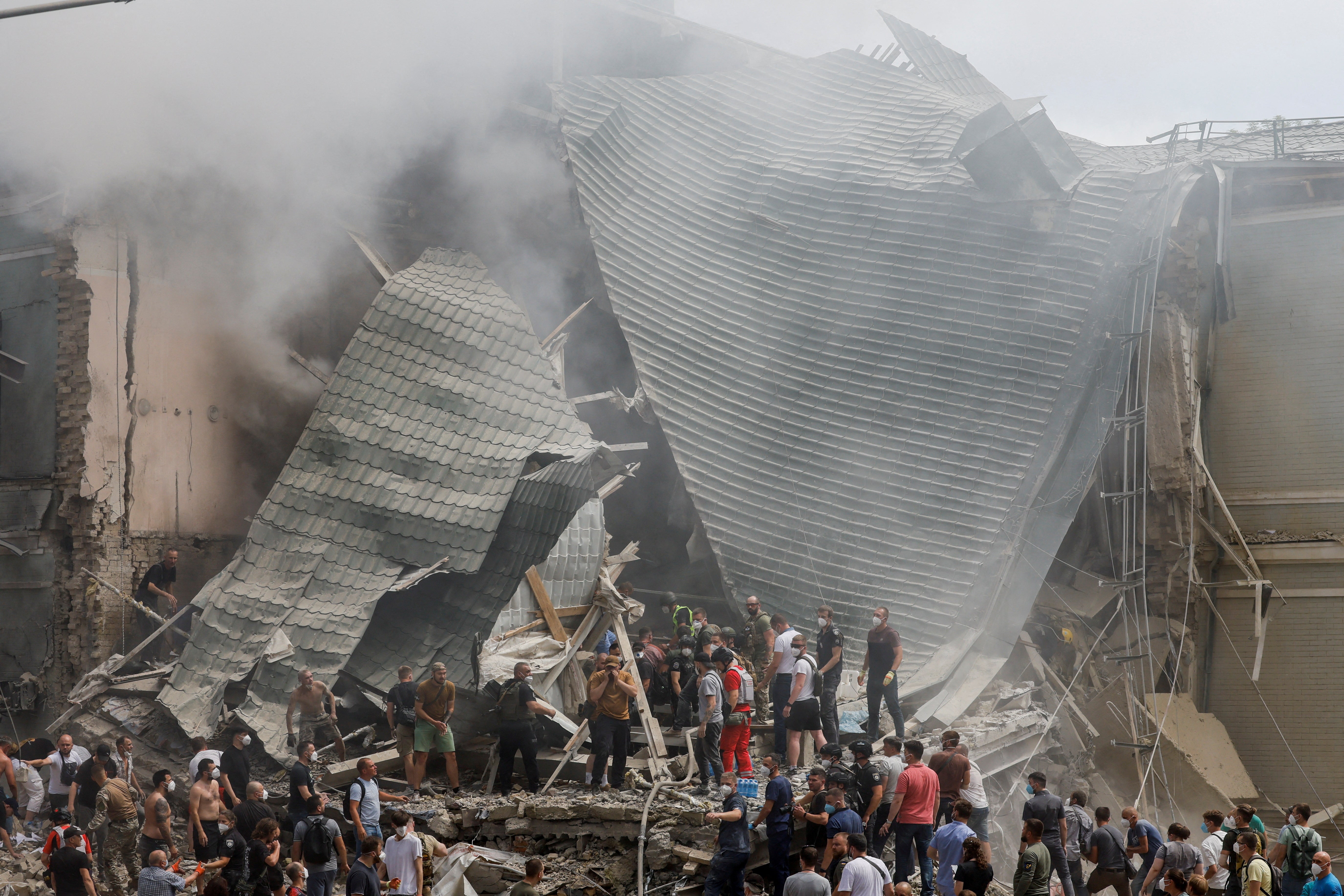 Rescuers work search for victims at the Okhmatdyt complex