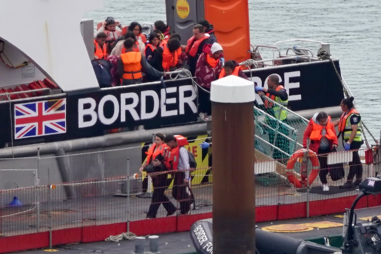 A group of people thought to be migrants are brought in to Dover, Kent, from a Border Force vessel following a small boat incident in the Channel (Gareth Fuller/PA)