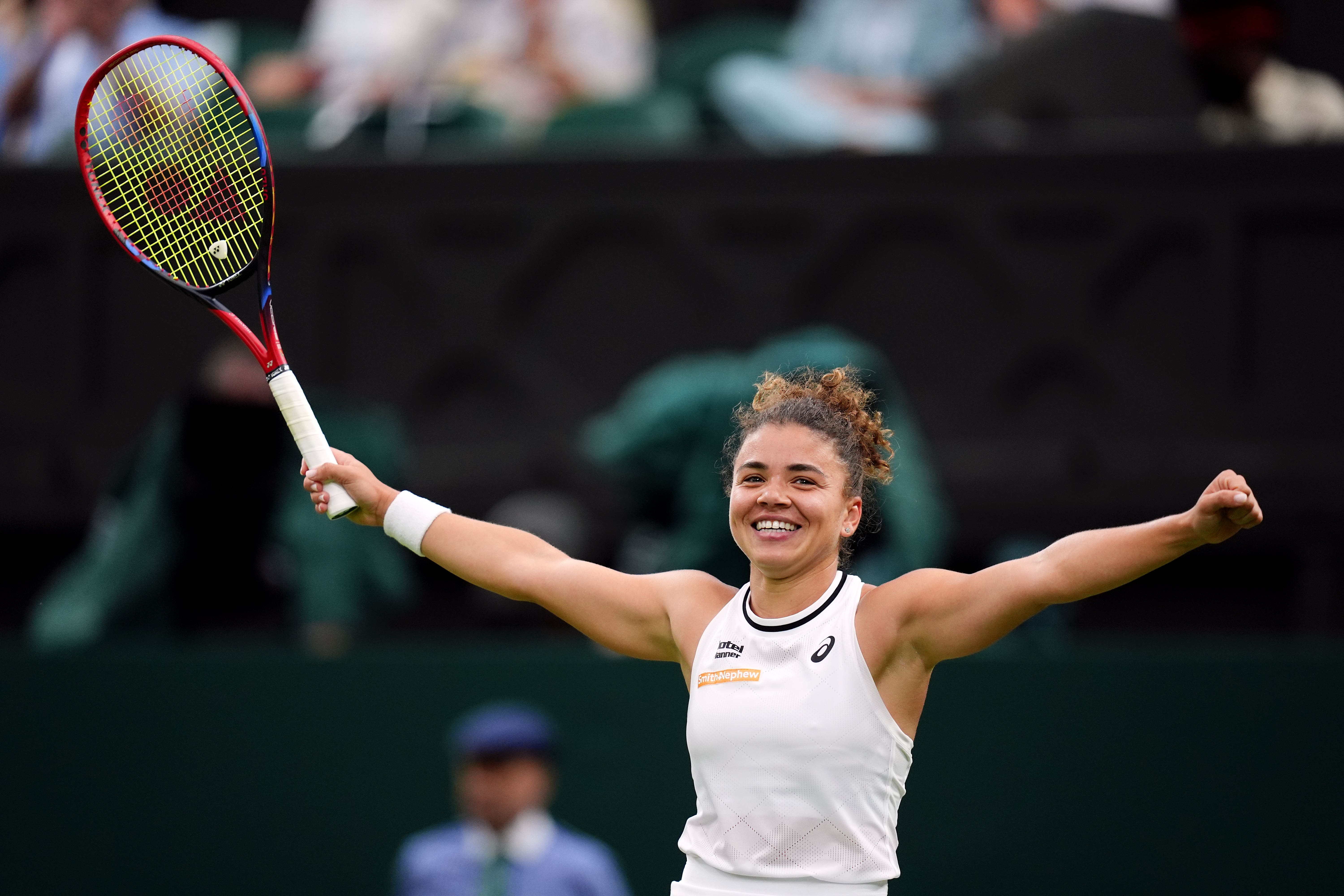 Jasmine Paolini celebrates beating Emma Navarro (John Walton/PA)