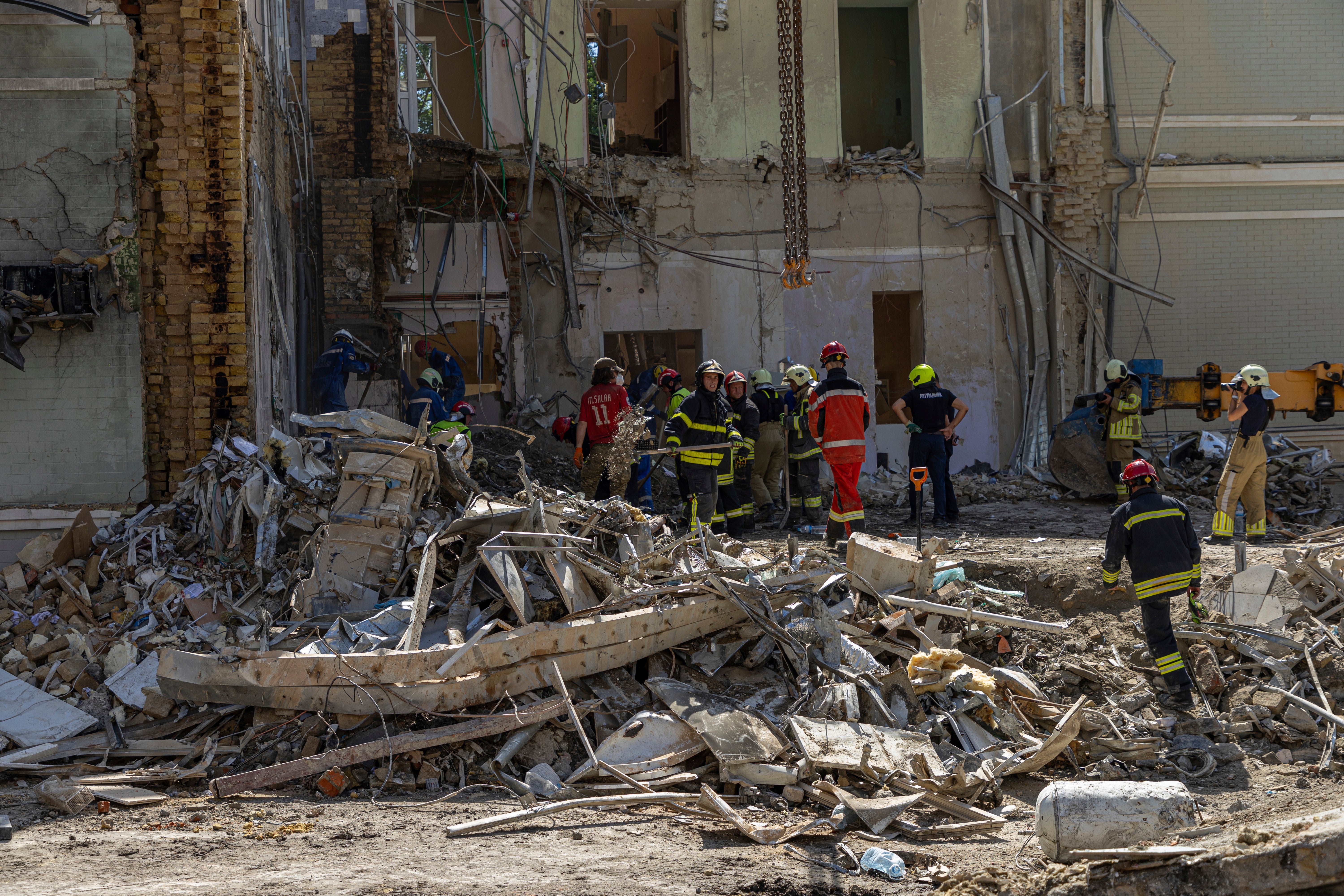 Rescue workers at the Ohmatdyt Children’s Hospital in Kyiv