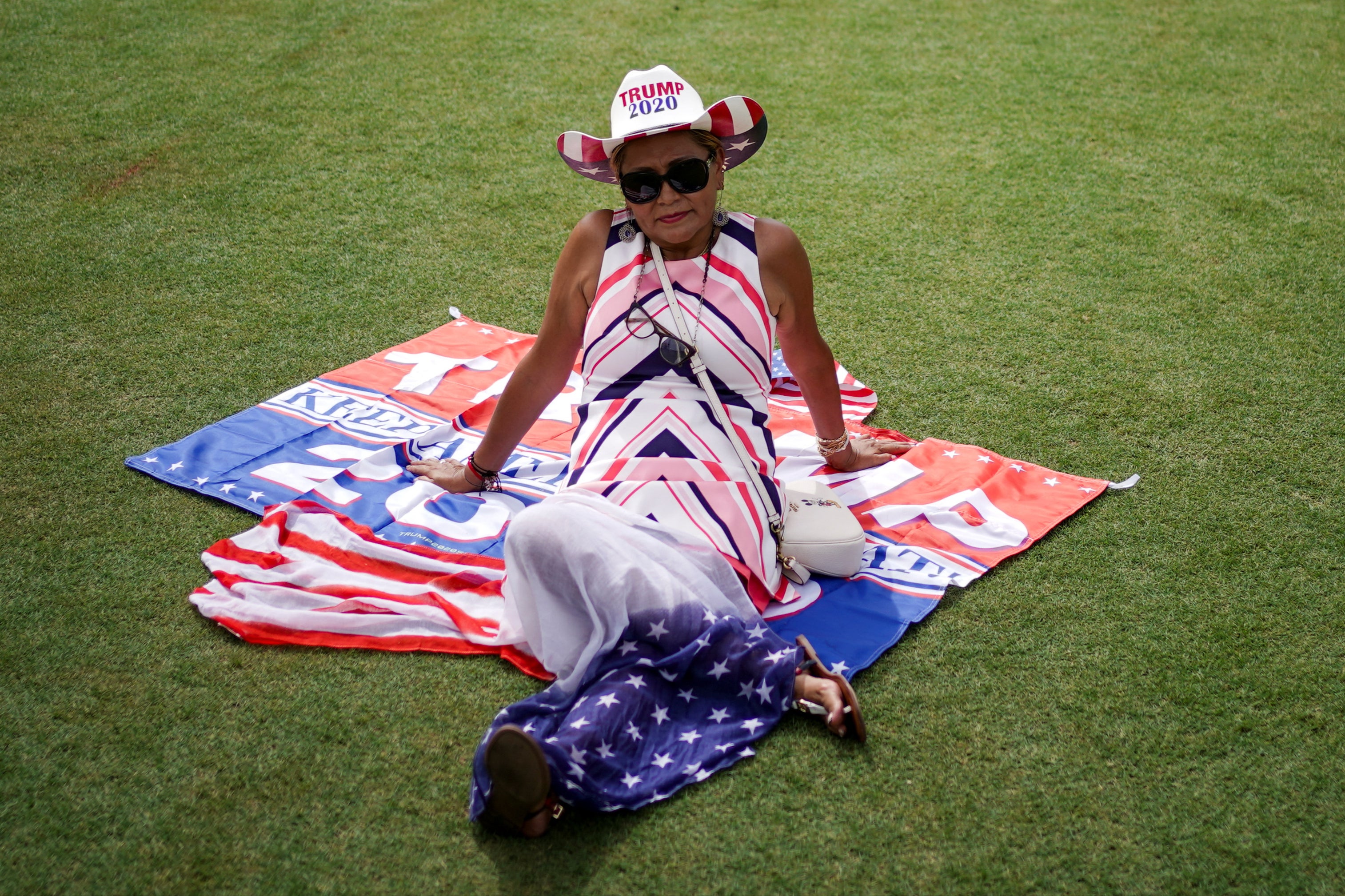 Trump supporters gathered at the former president’s golf club in Miami ahead of the rally on Tuesday evening