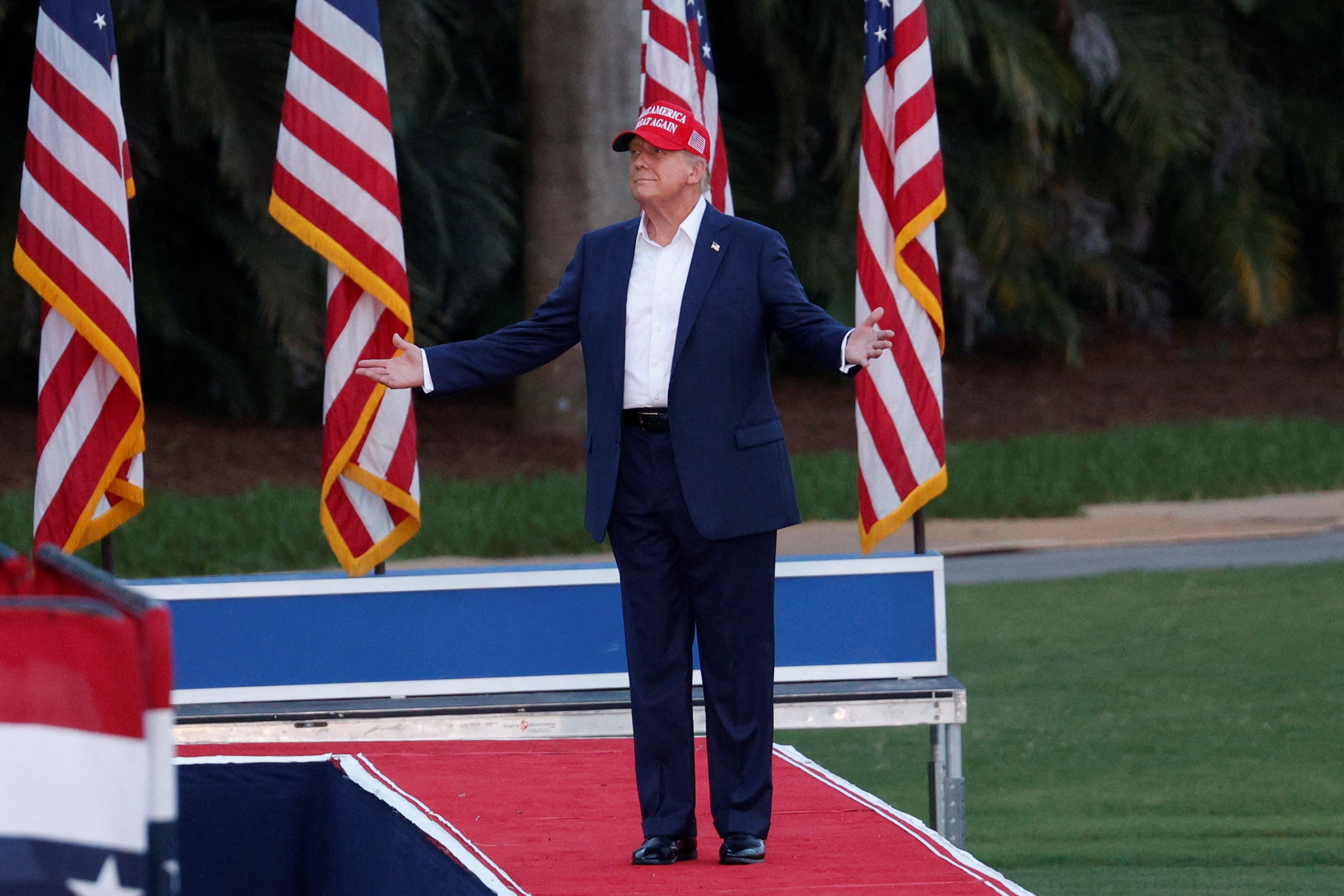 Donald Trump arrives at a campaign rally at his golf resort in Miami, Florida, in July 2024