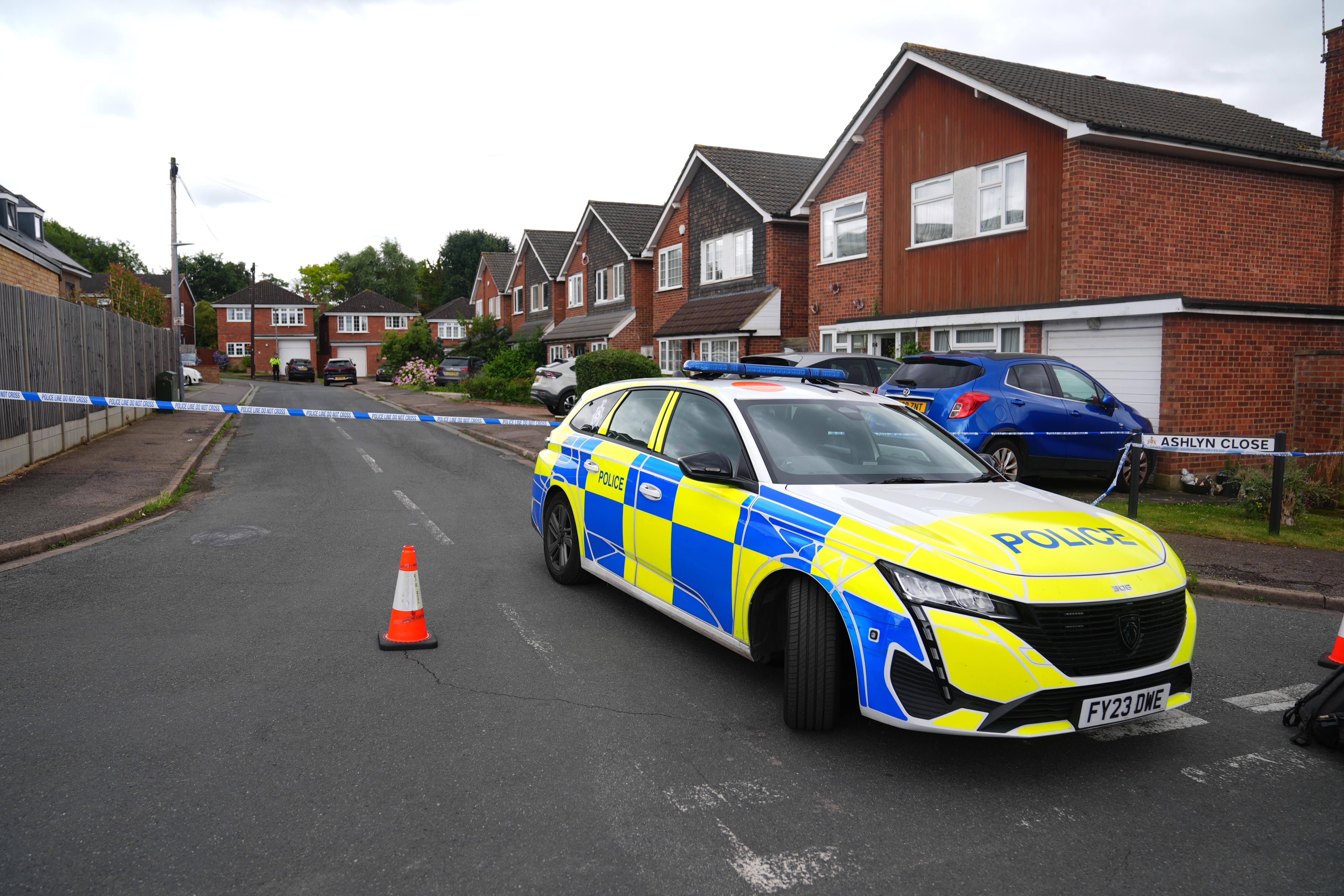 Police at the scene in Ashlyn Close, Bushey (James Manning/PA)