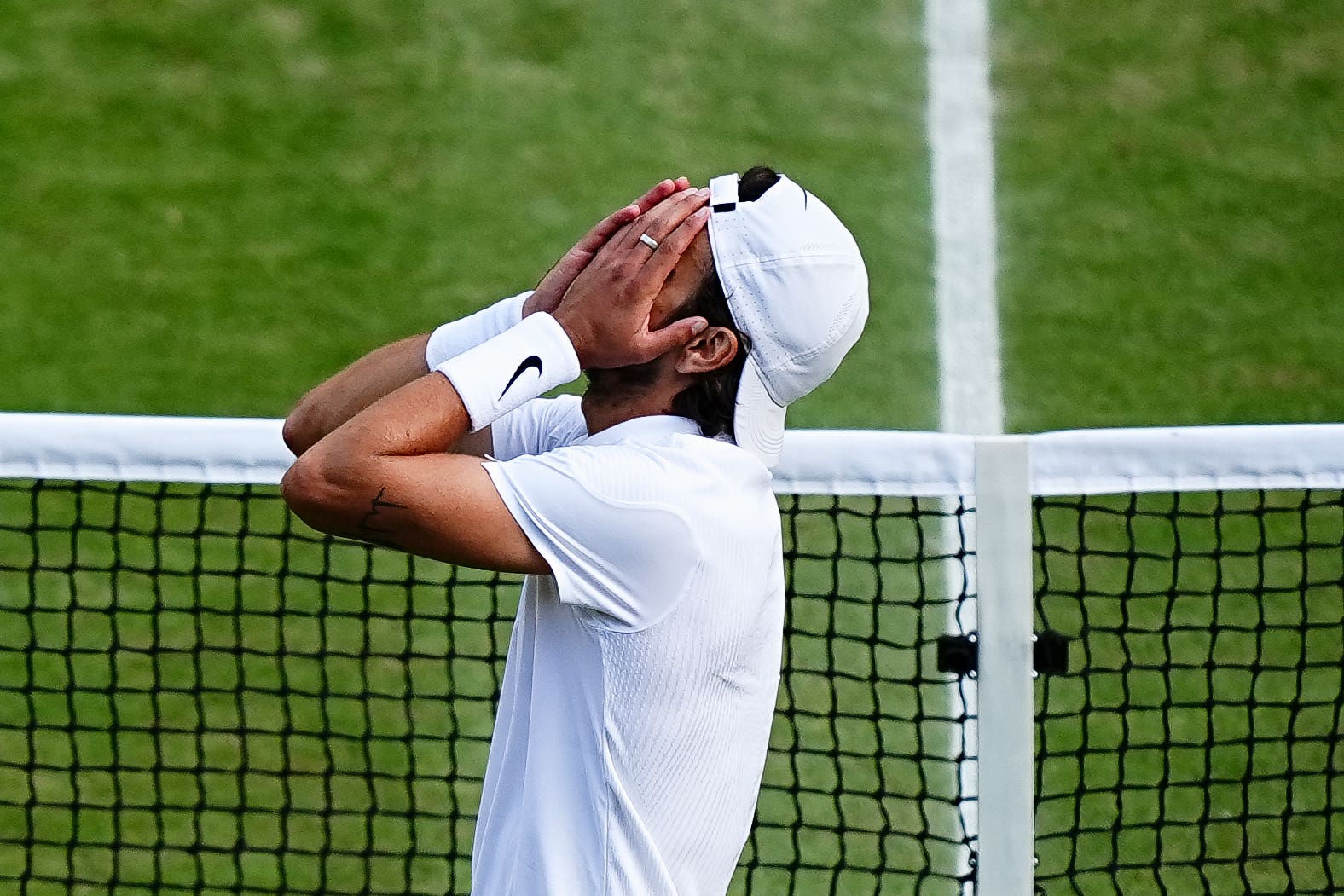 Lorenzo Musetti reacts to beating Taylor Fritz (Aaron Chown/PA)