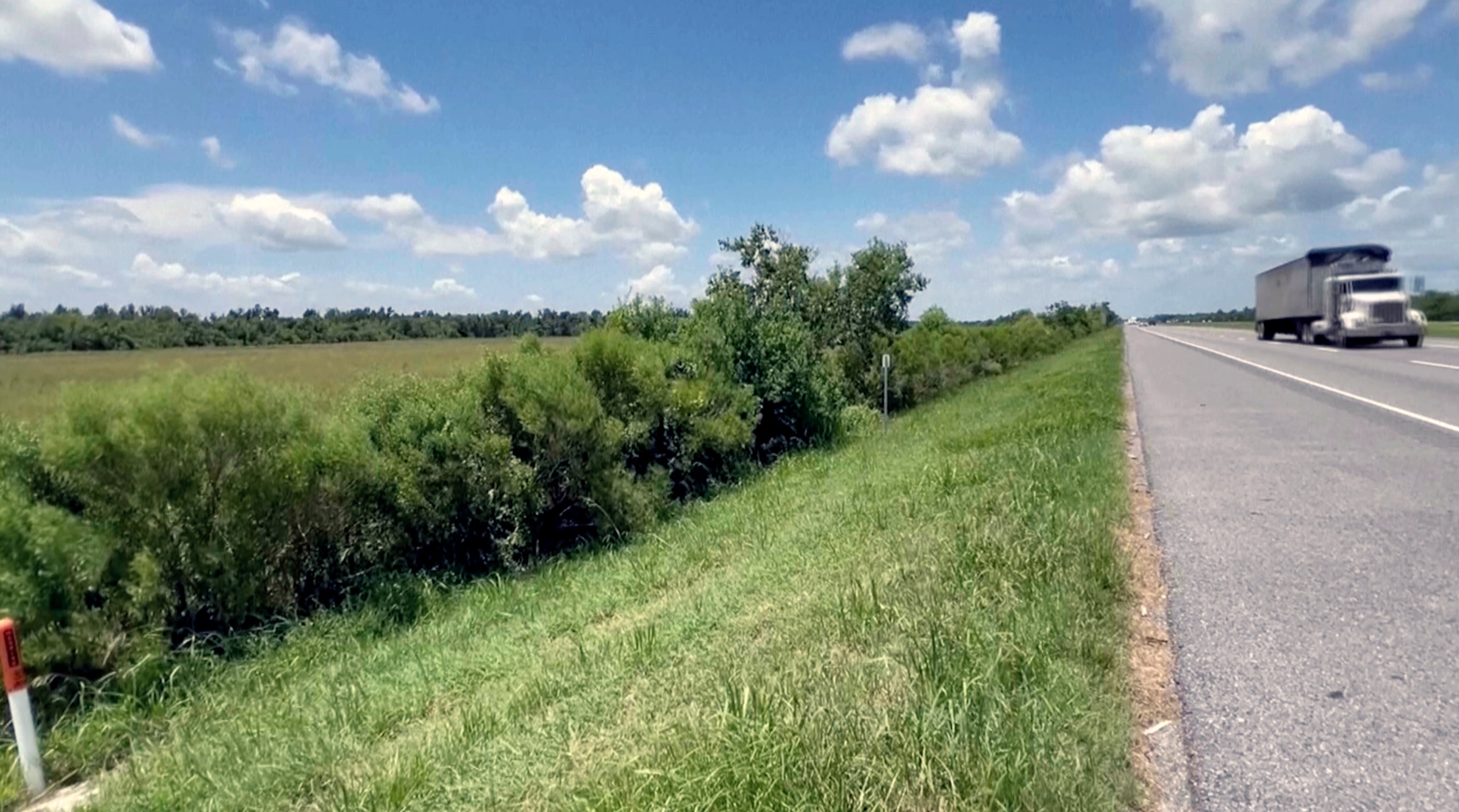 A truck passing along the highway where a one-year-old child was found on Tuesday, July 9, 2024