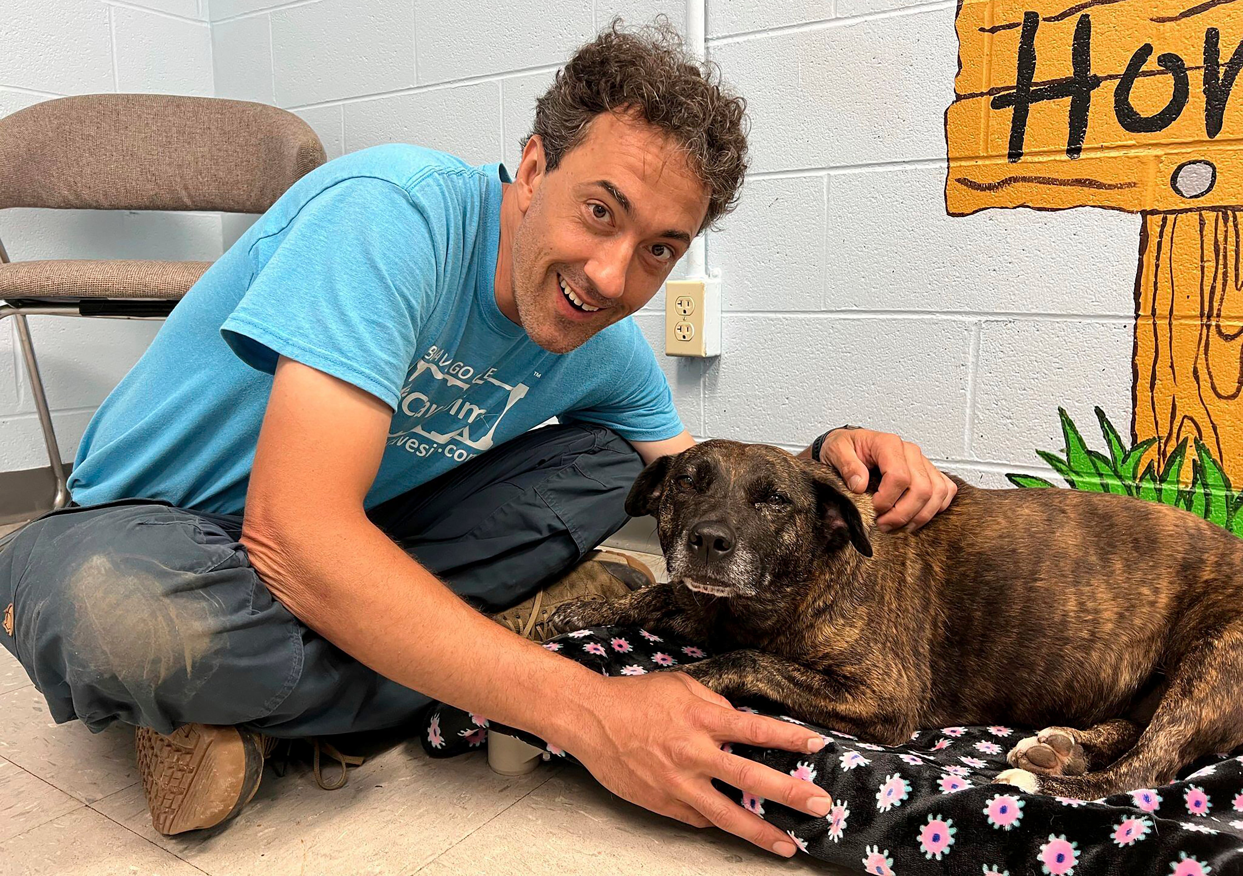 Jesse Rochette poses with Sparsy at the shelter in Pearisburg