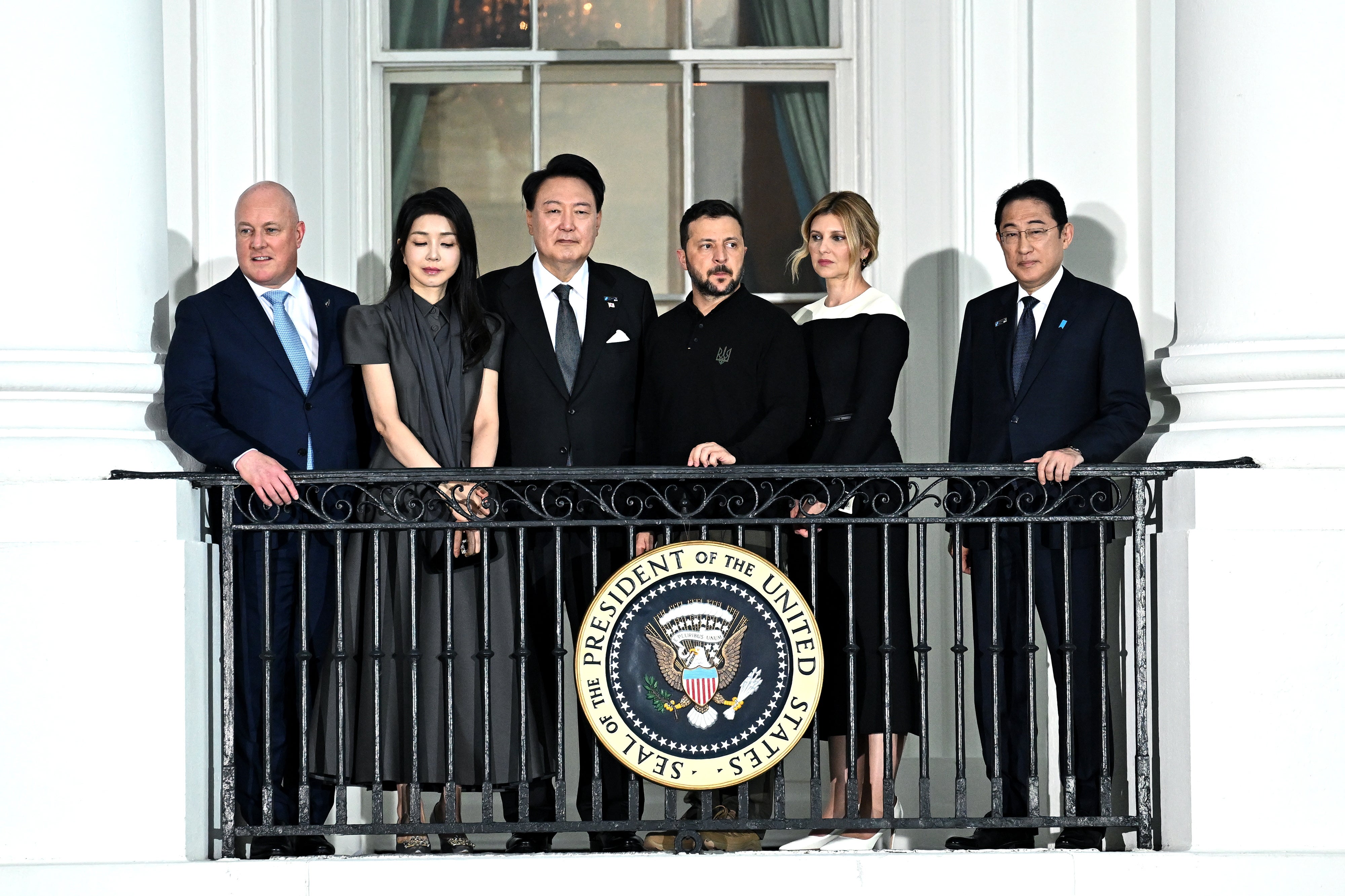 Christopher Luxon, New Zealand's prime minister; Kim Keon Hee, first lady of South Korea; Yoon Suk Yeol, South Korea's president; Volodymyr Zelensky, Ukraine’s president