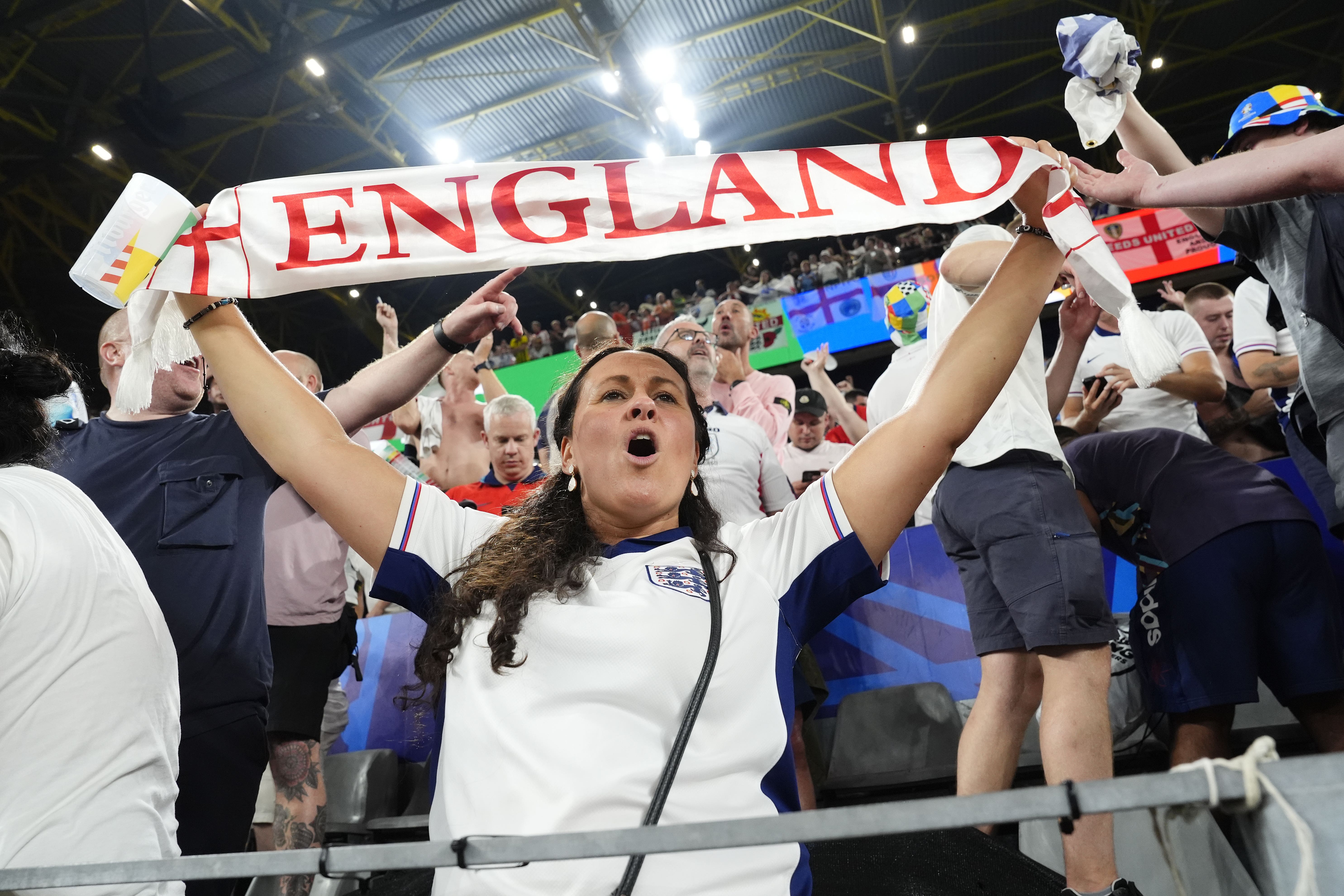 England fans celebrate the win over the Netherlands n the stands after the Euro 2024 semi-final in Dortmund, Germany (Nick Potts/PA)